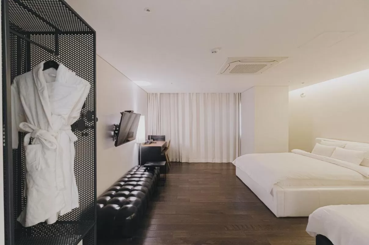 Bed in ACC Design Hotel