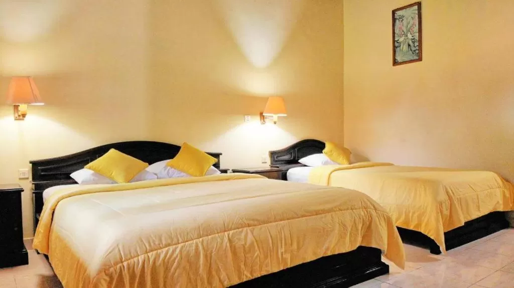 Bed in Masainn Hotel Kuta