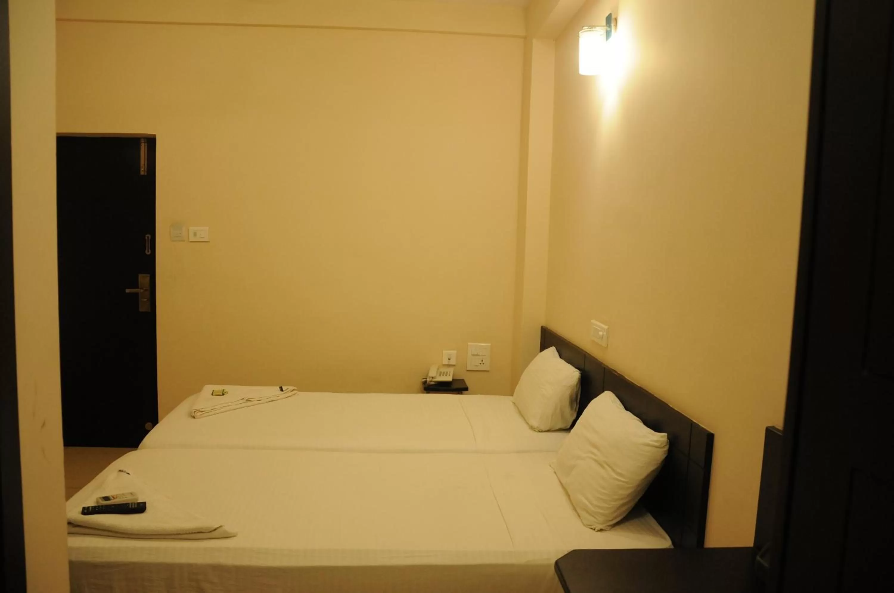 Bed in Hotel Sri Krishna Residency