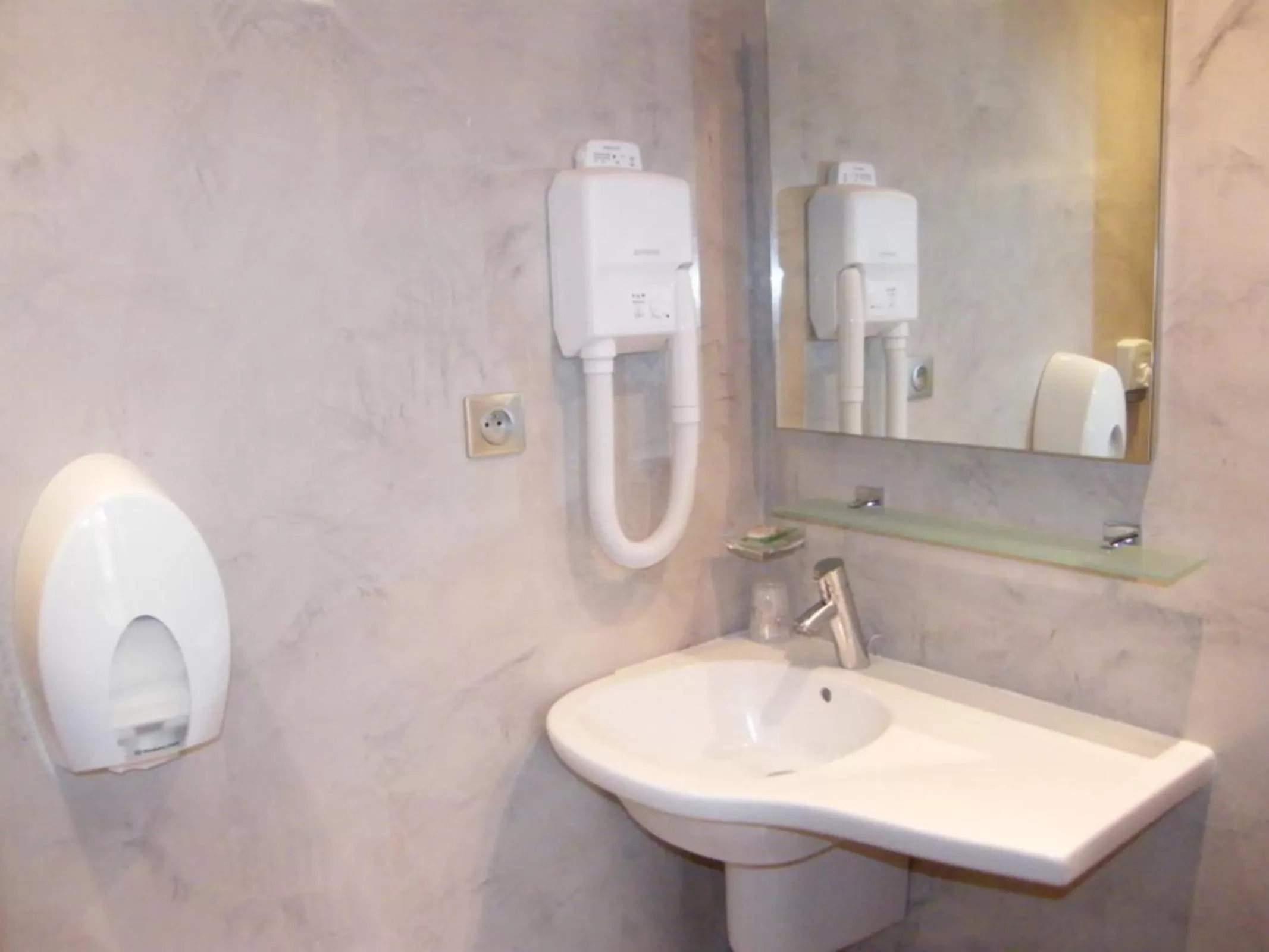 Bathroom in CIT'HOTEL Saint-Pierre