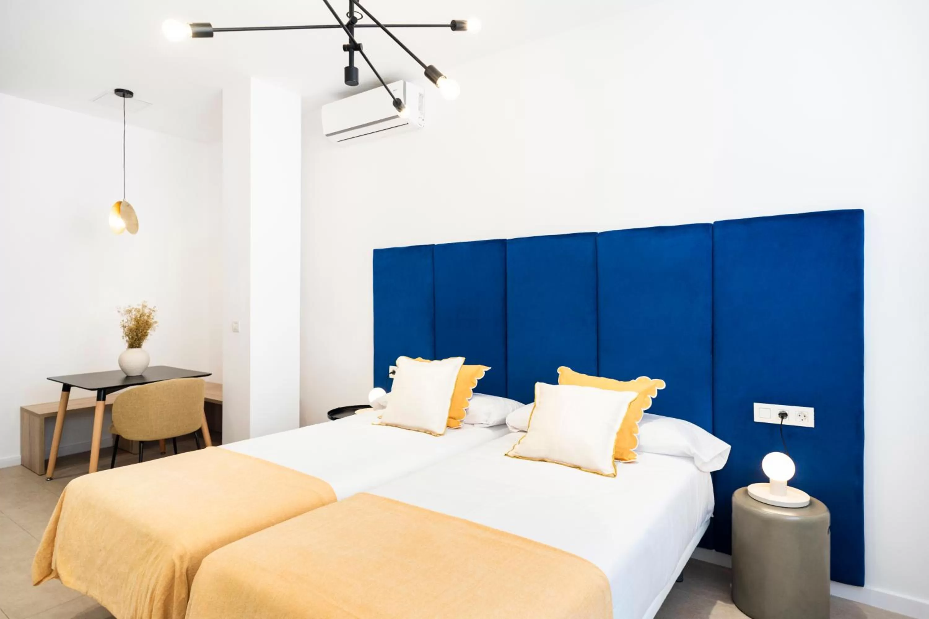 Bed in Blanq Marina Suites