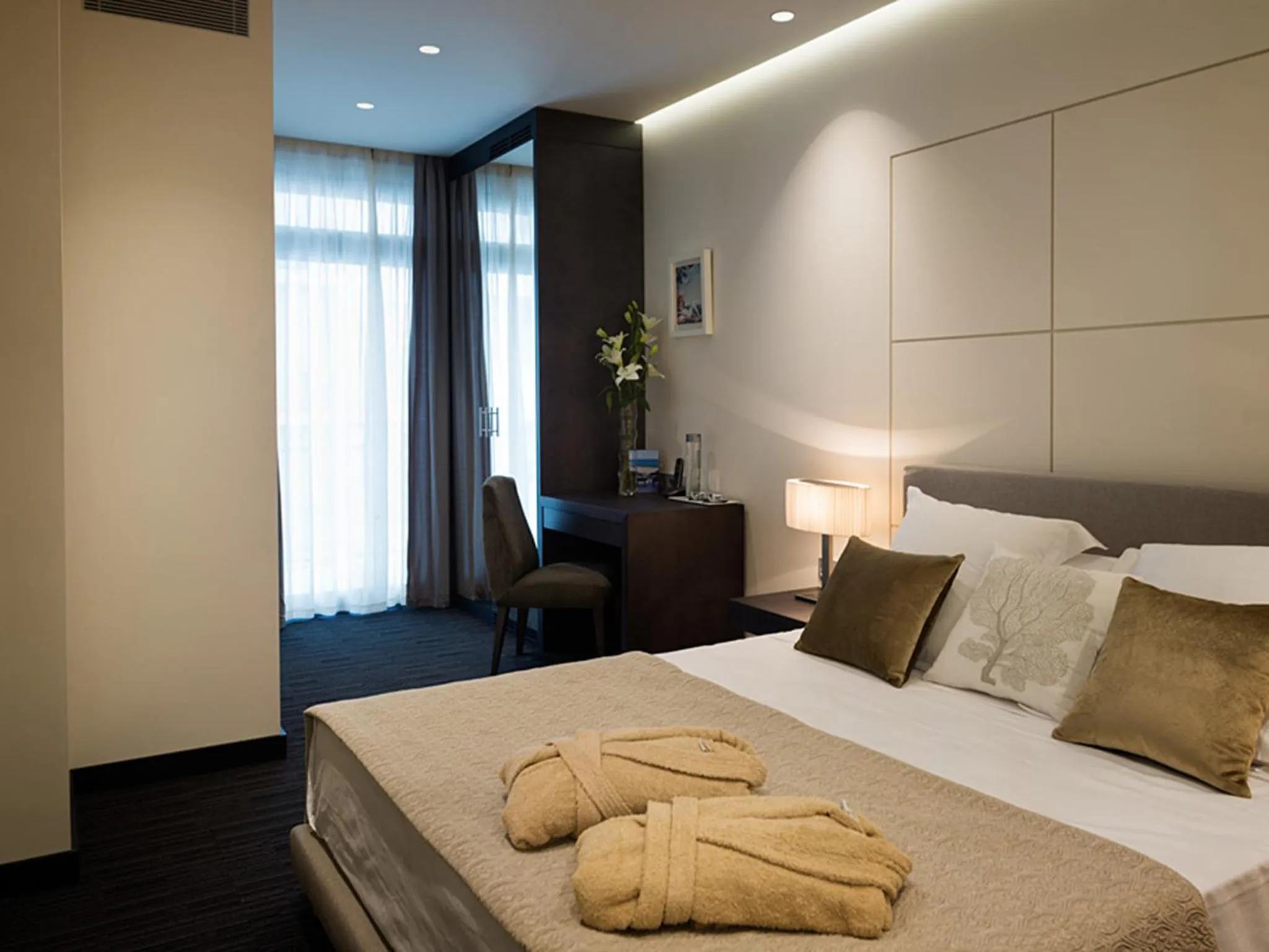 Bed in Cosmopolita Hotel Boutique & Spa