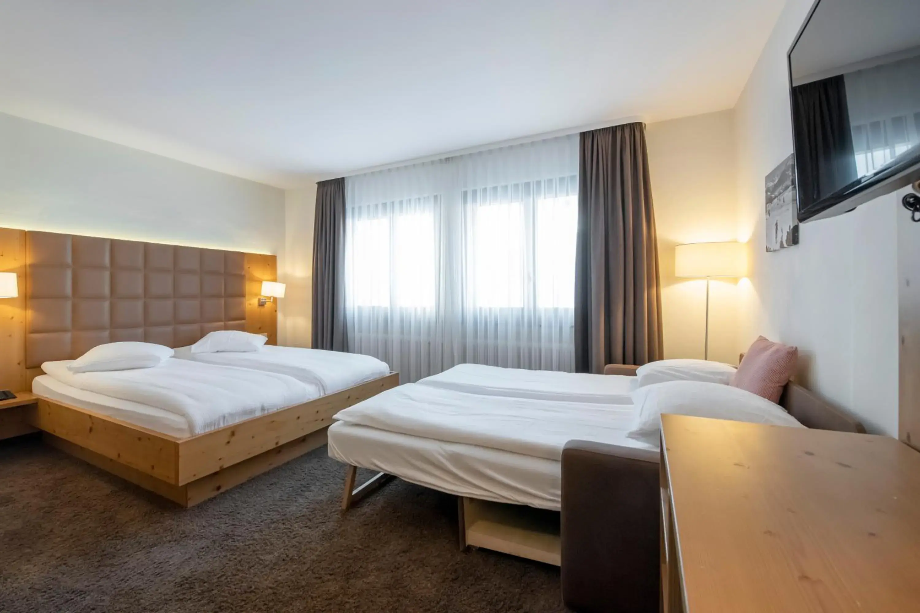 Quadruple Room in Hotel Olympic - Montana Center Quadruple Room in Hotel Olympic - Montana Center