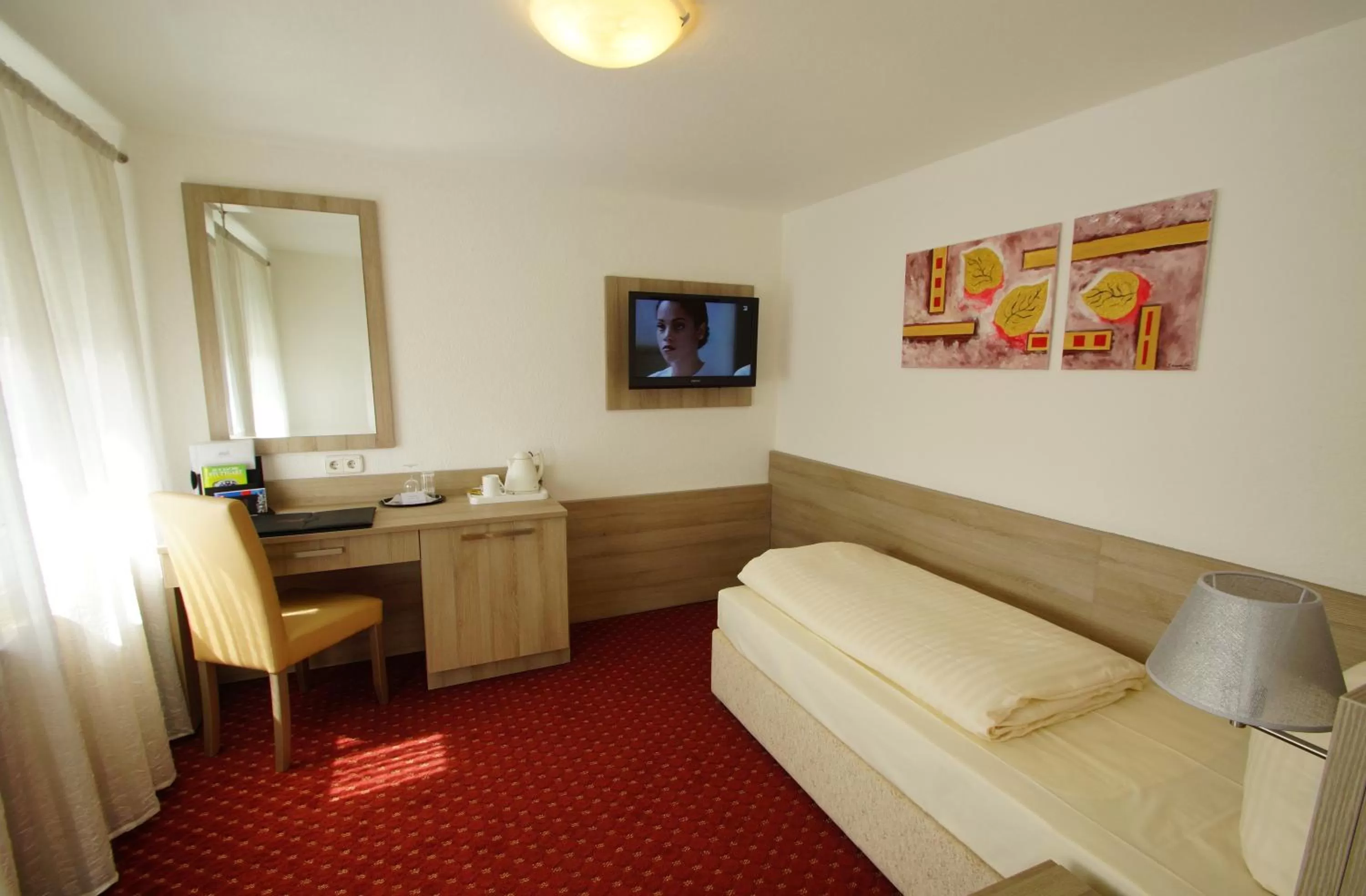 Bed in Airport Hotel Filder Post