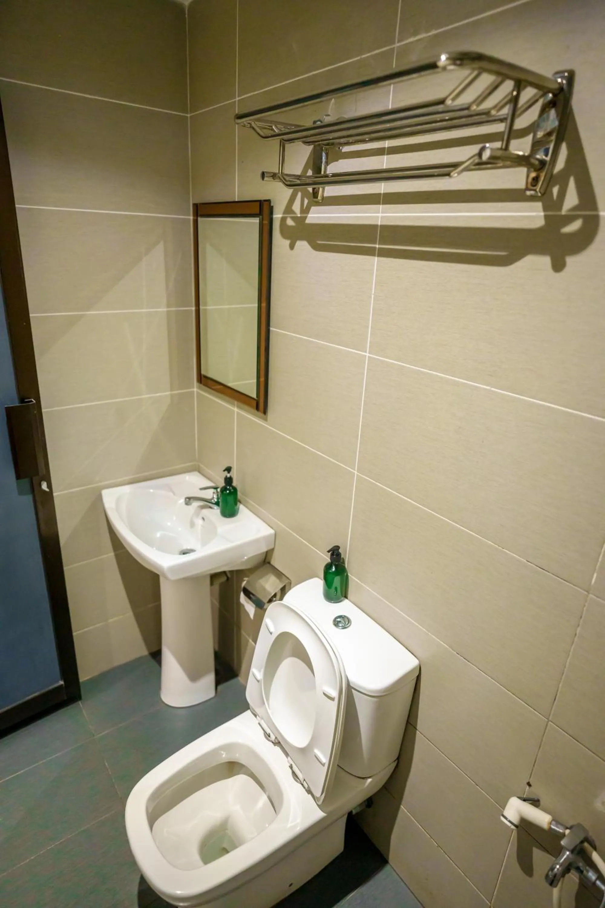 Toilet in Alaxis Hotel