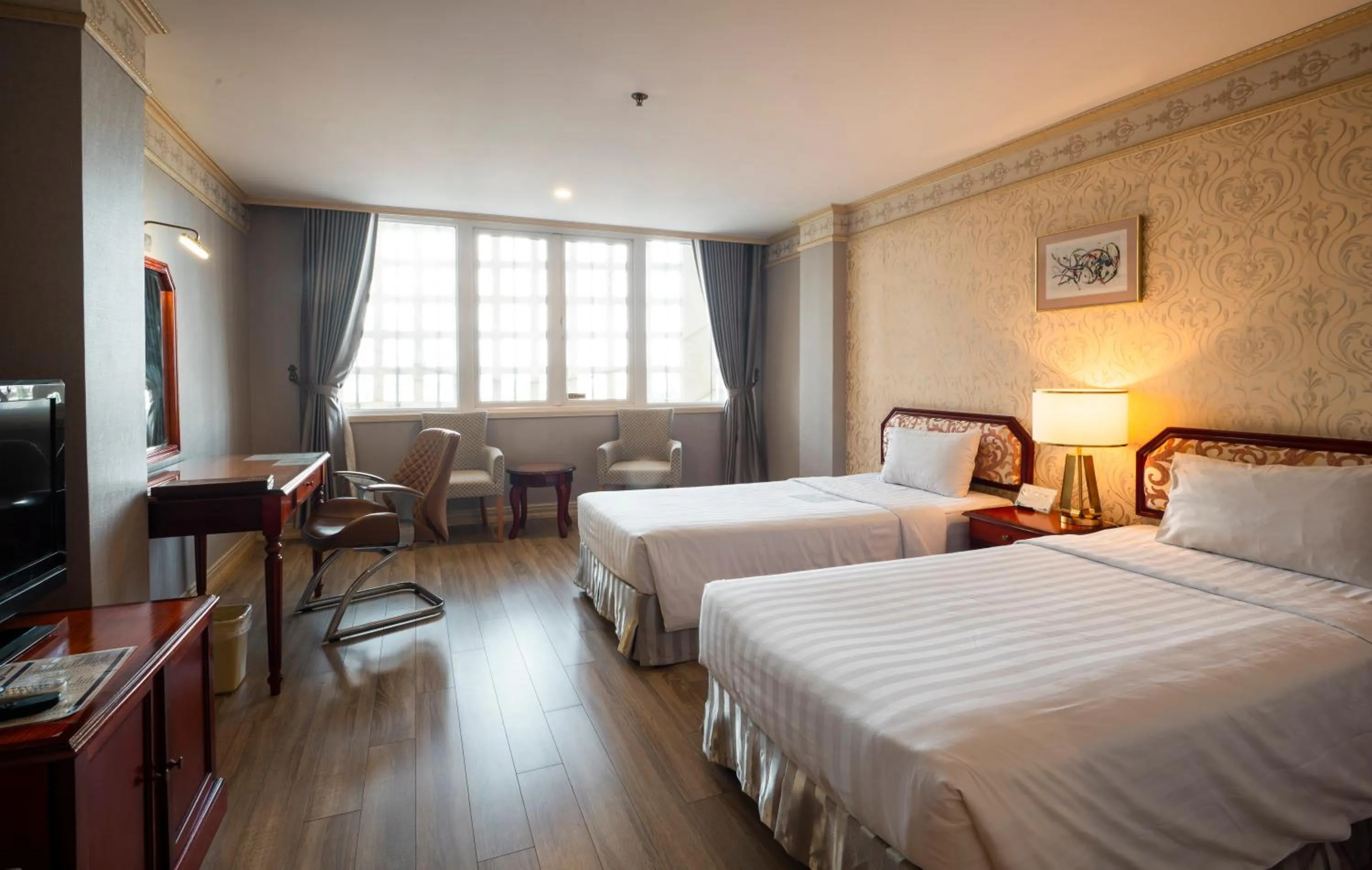 Photo of the whole room, Bed in Lotus Saigon Hotel