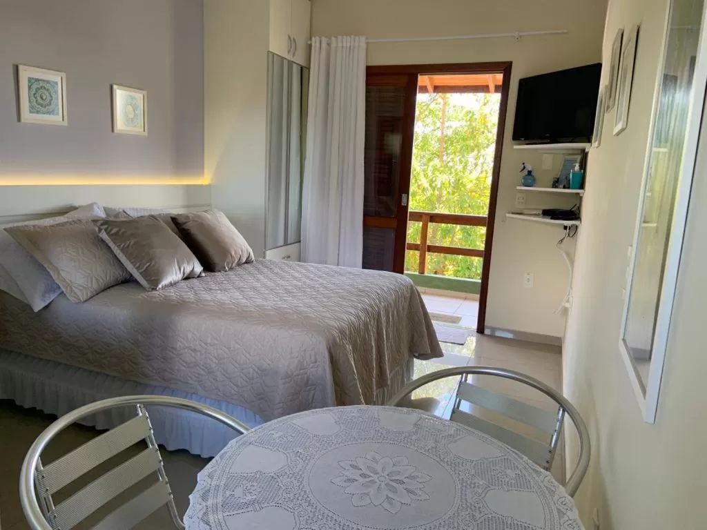 Bed in Pousada Mar de Cristal