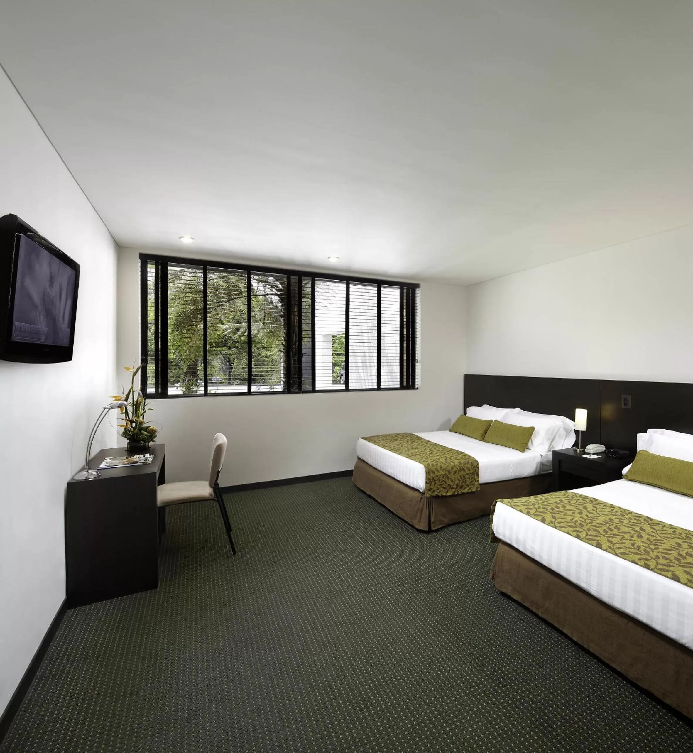Photo of the whole room, Bed in Estelar Recinto Del Pensamiento Hotel Y Centro De Convenciones