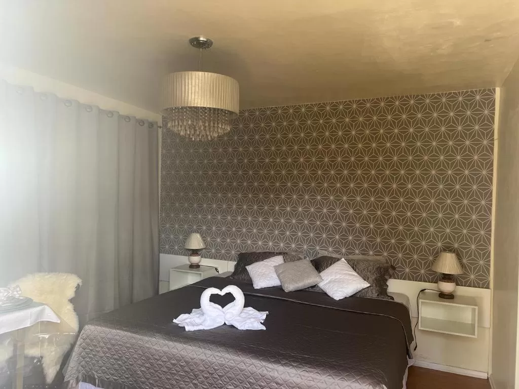 Bed in Pousada Lanai Canela