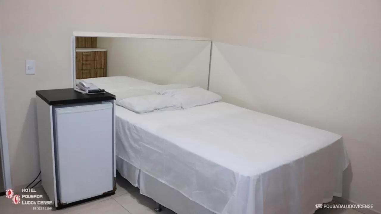 Bed in Hotel Pousada Ludovicense