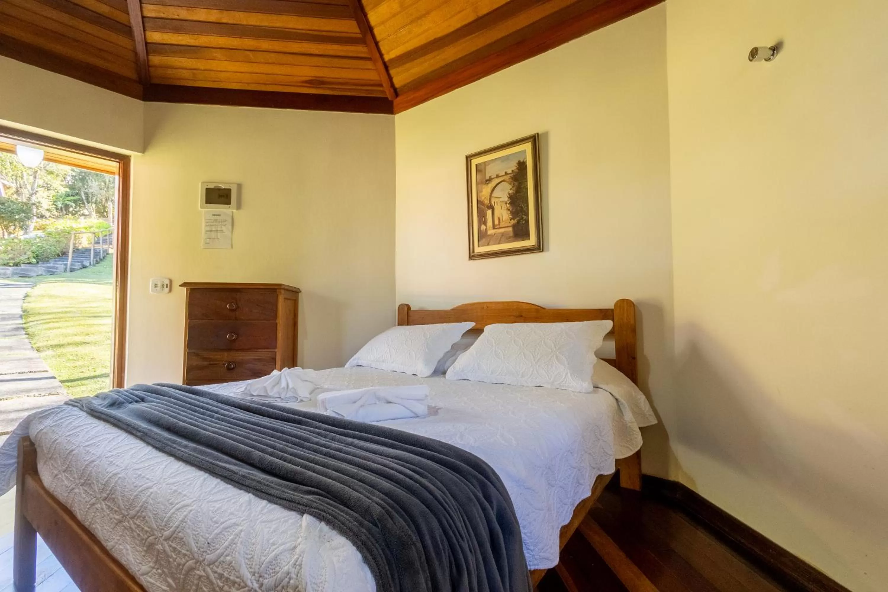 Bed in Chalés 3 Pinheiros