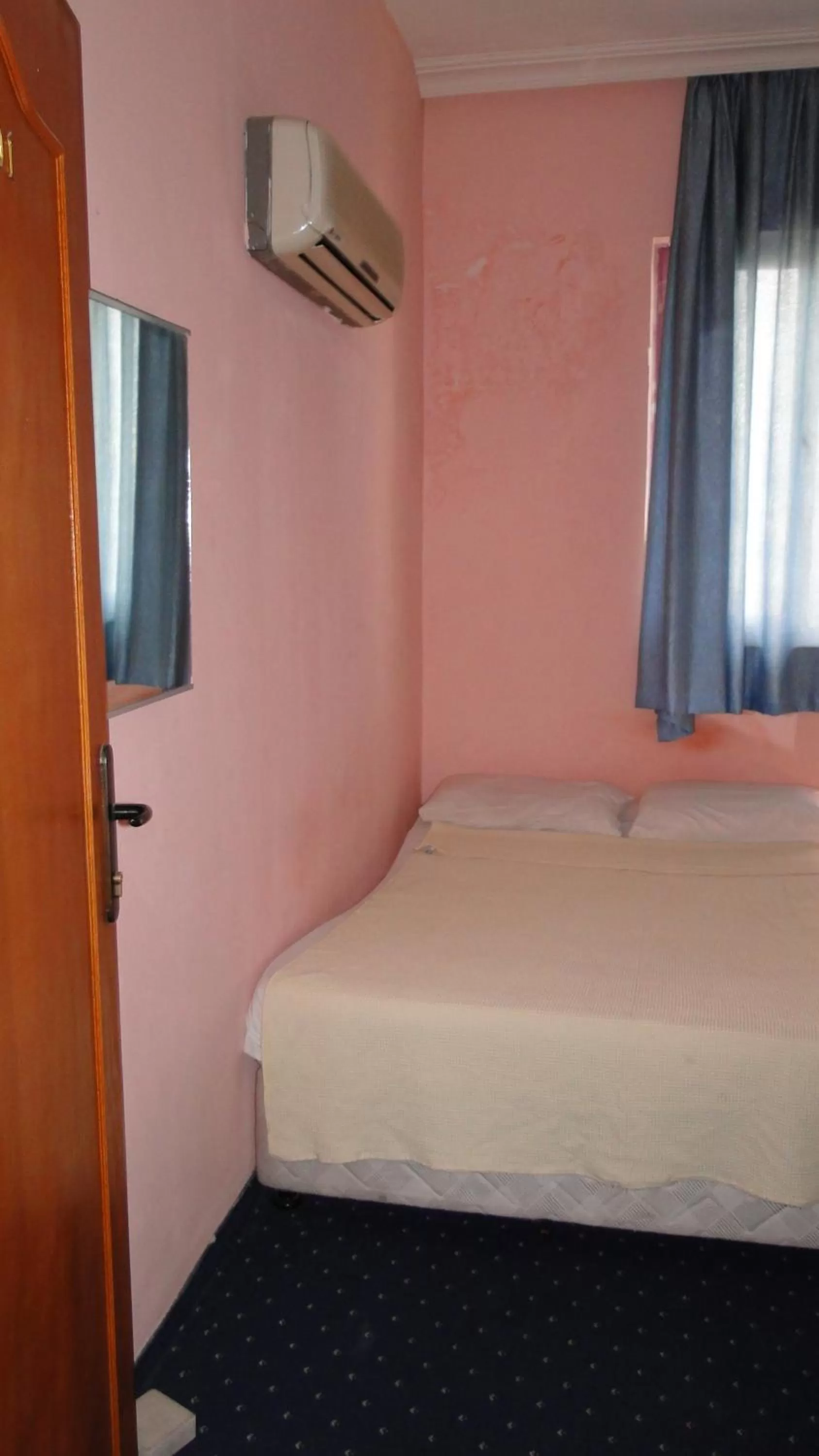 Bed in Sunrise Hotel