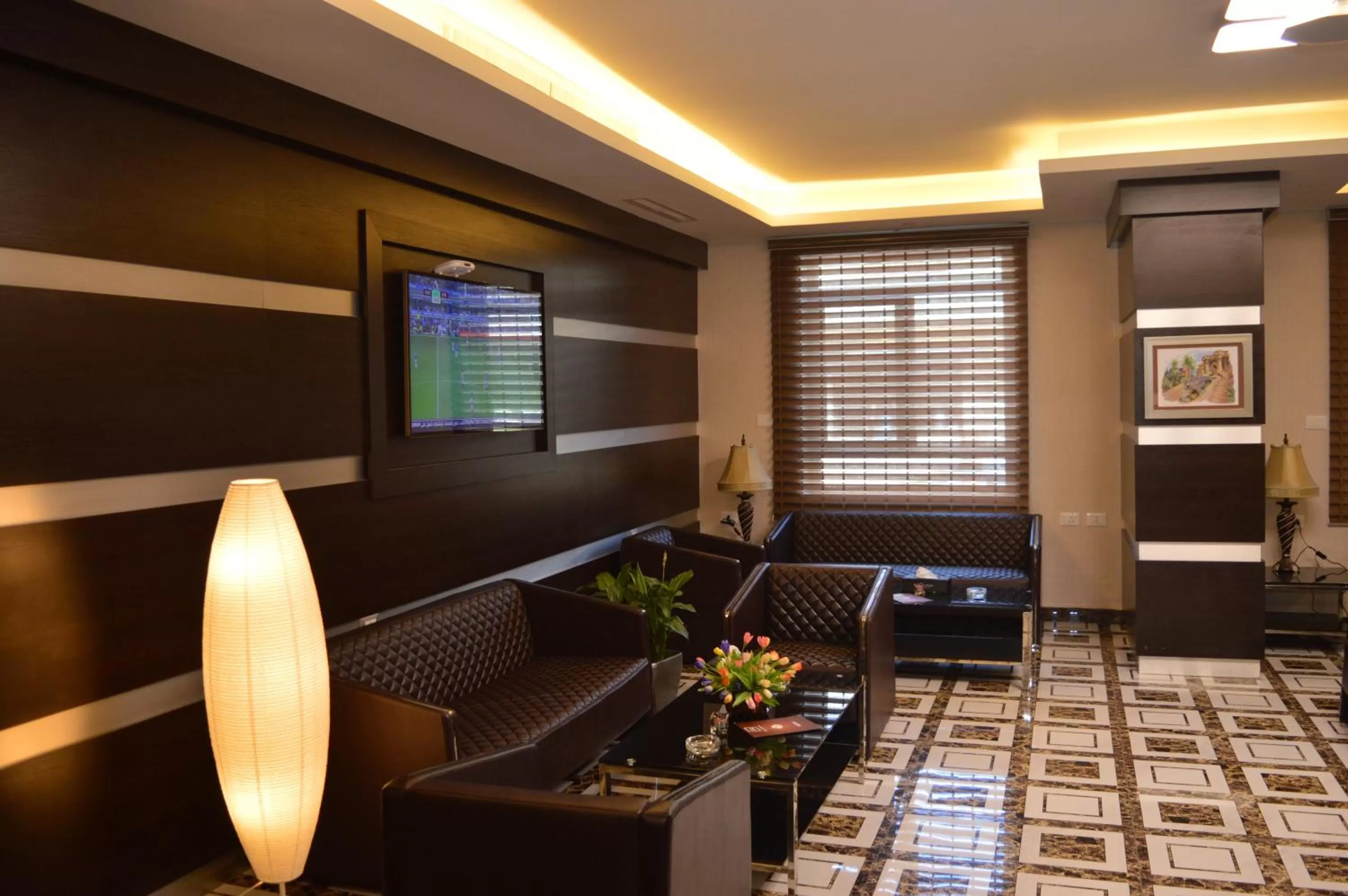 Lounge or bar in Tilal Almadina Hotel & Suites