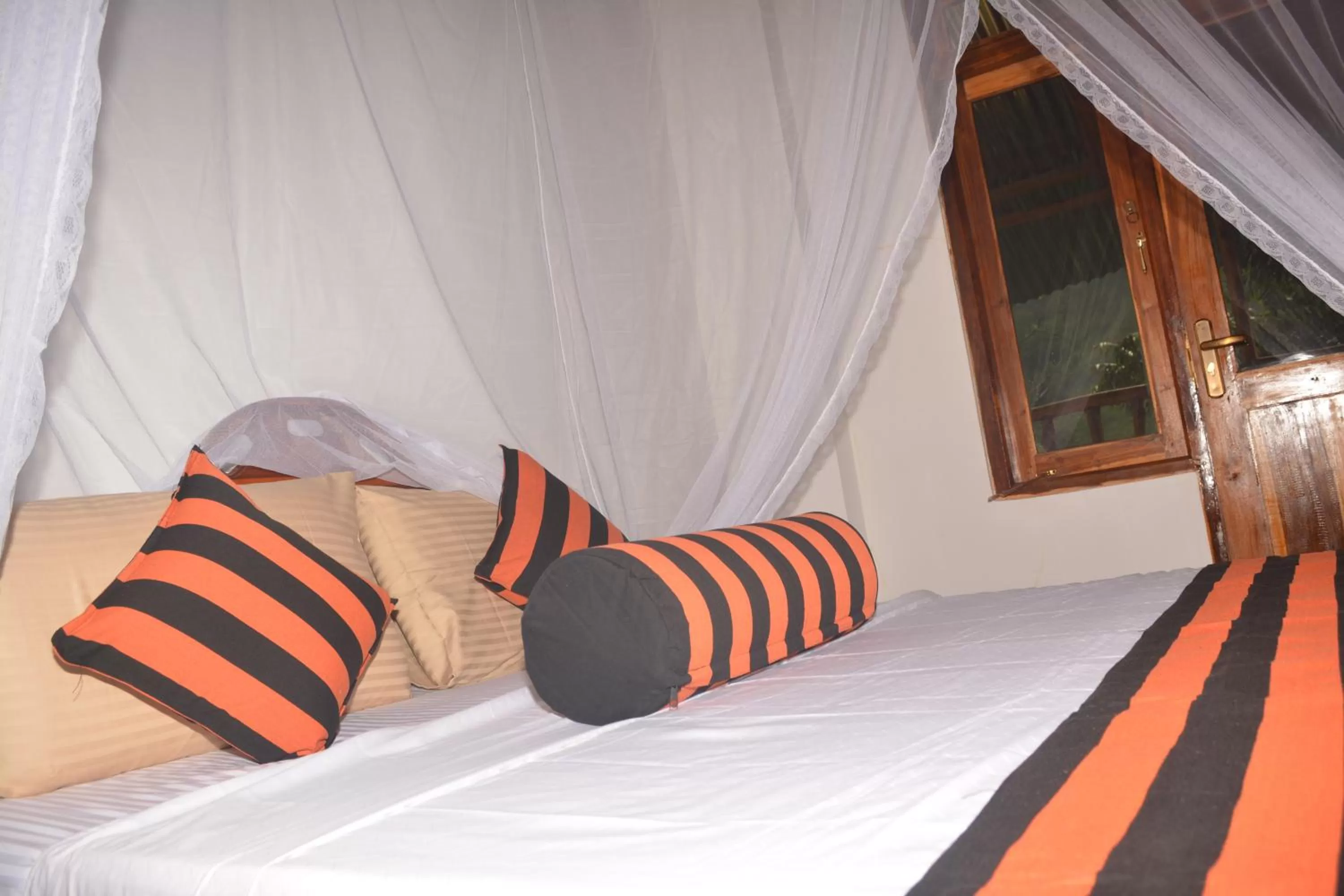 Bed in Ella River Face Inn