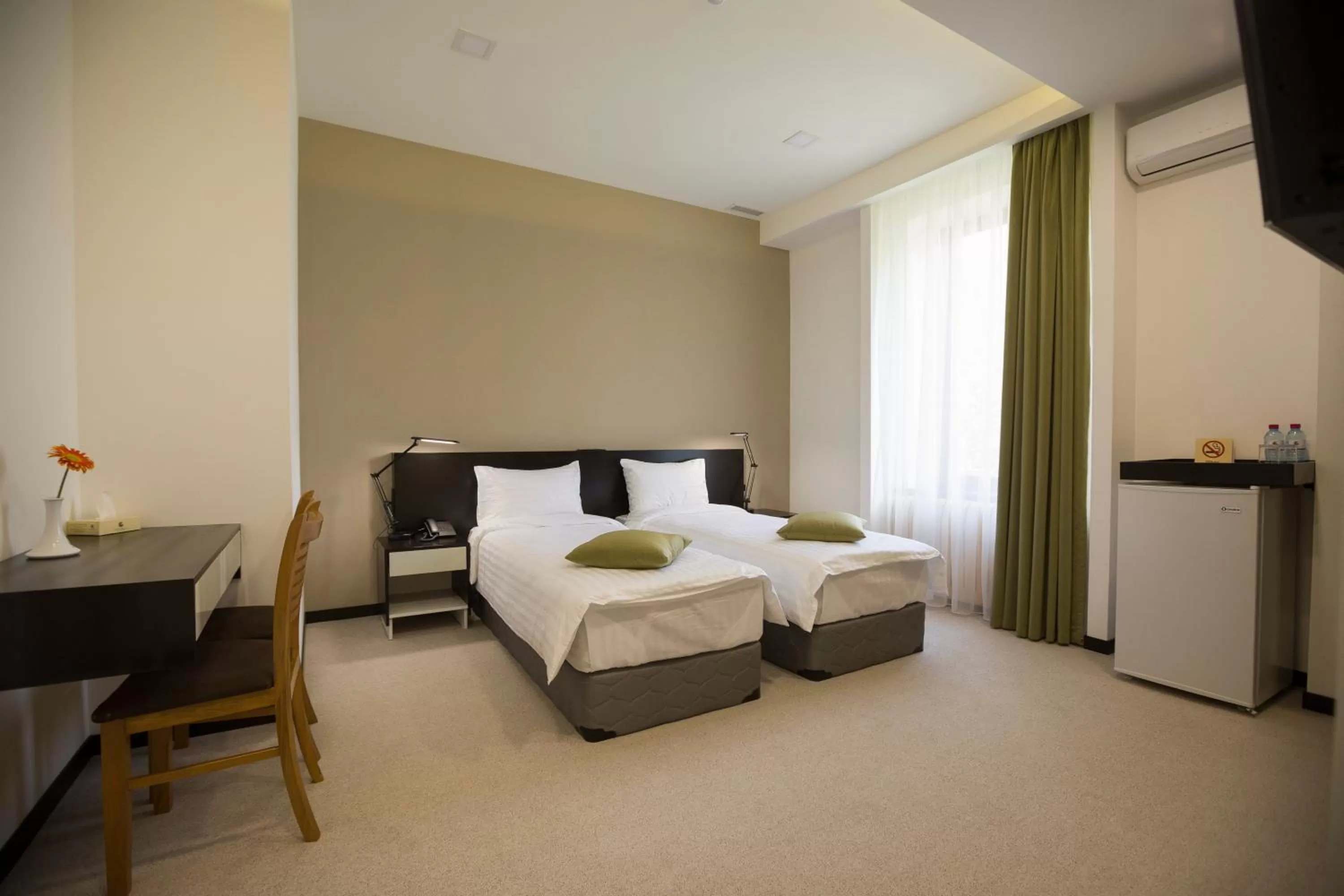 Bed in AnnaBella Boutique Hotel