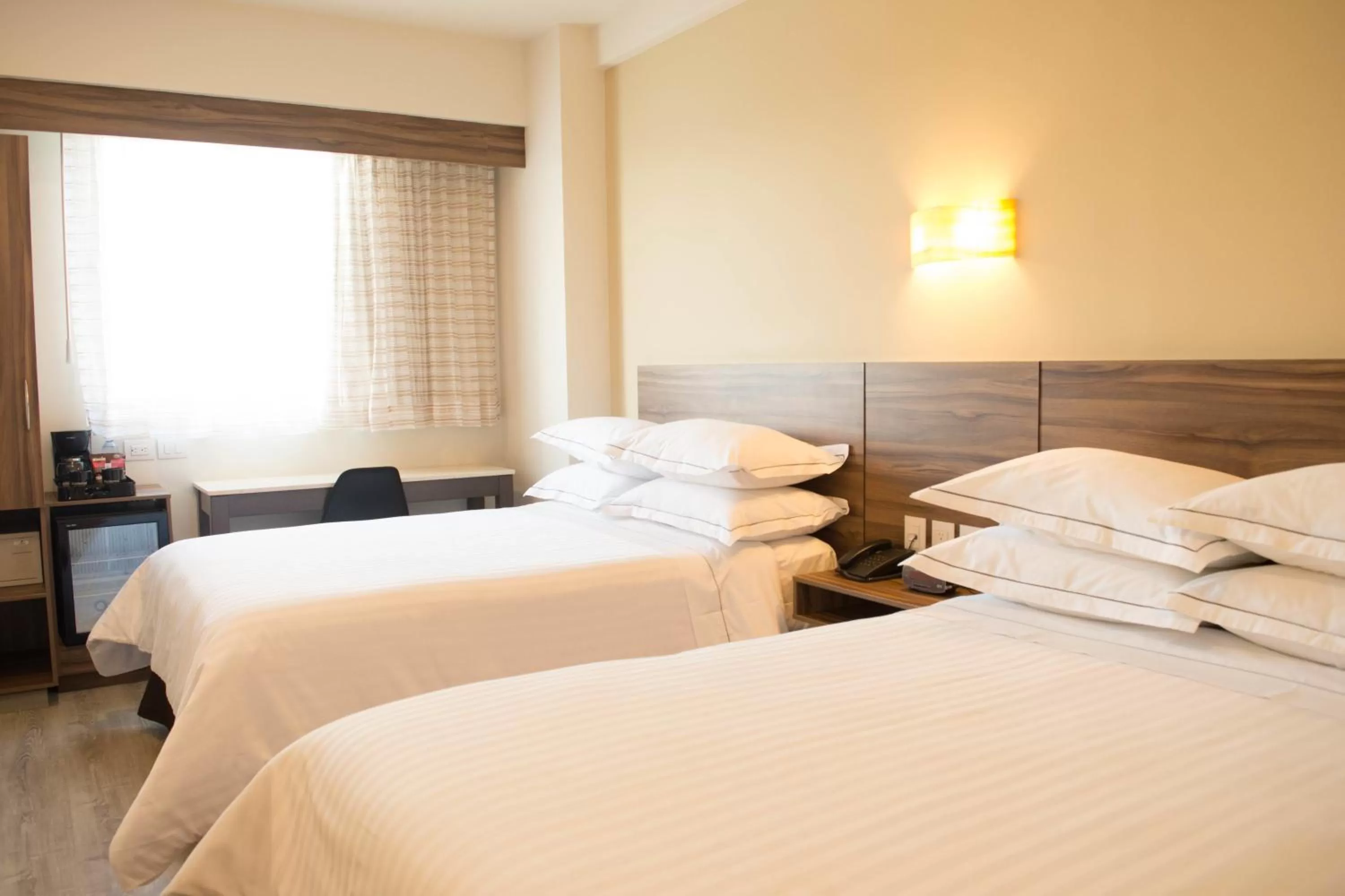 Decorative detail, Bed in Crown Victoria Hotel