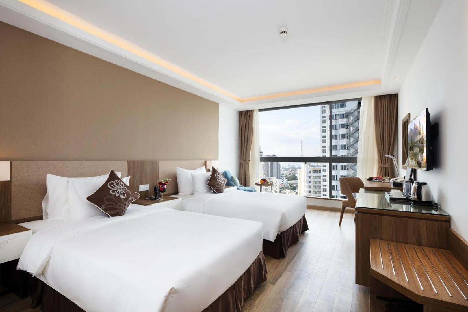 Photo of the whole room, Bed in Comodo Nha Trang Hotel