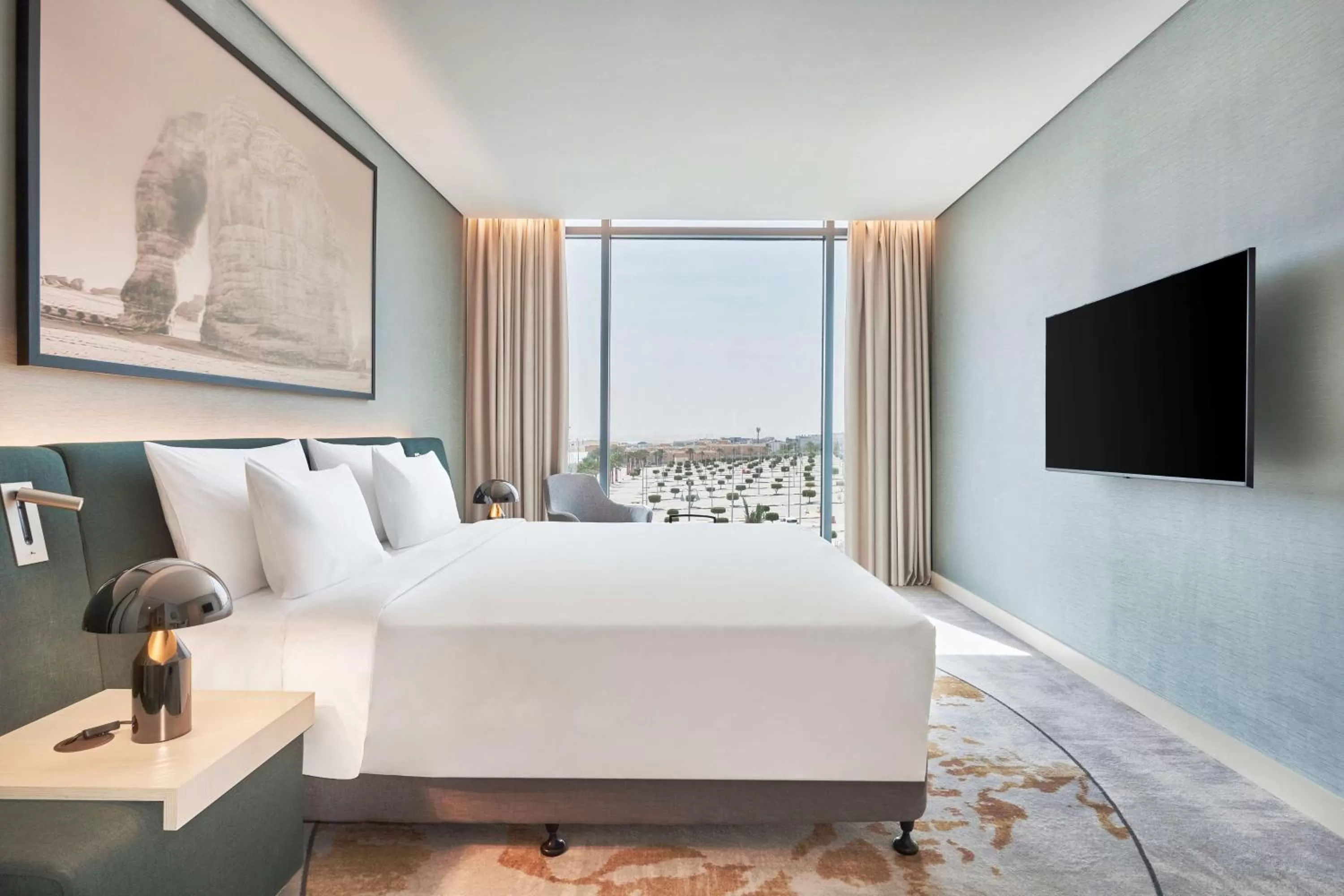 Photo of the whole room, Bed in Radisson Blu Hotel Riyadh Convention and Exhibition Center