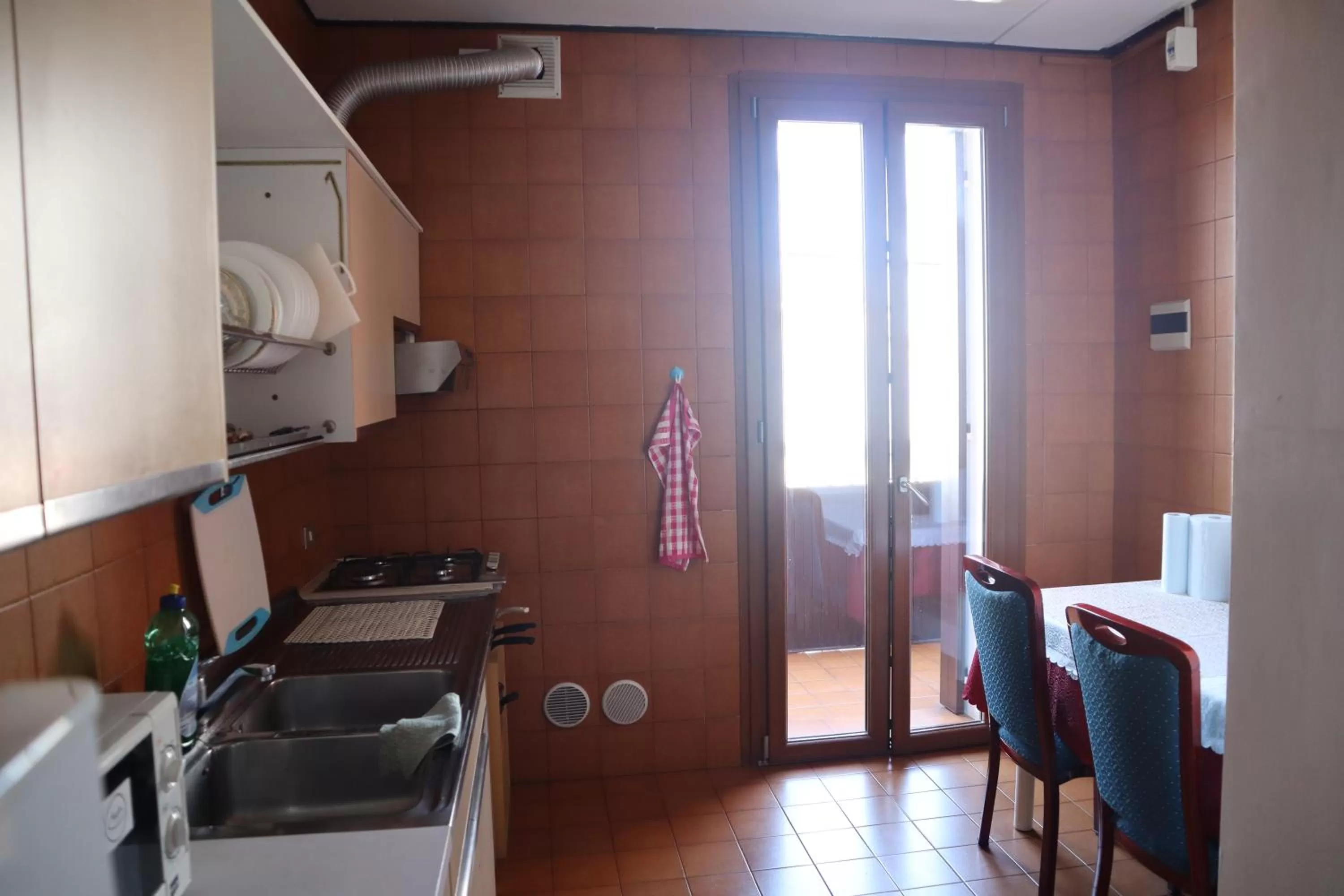 Kitchen or kitchenette in b&b Wu Giada