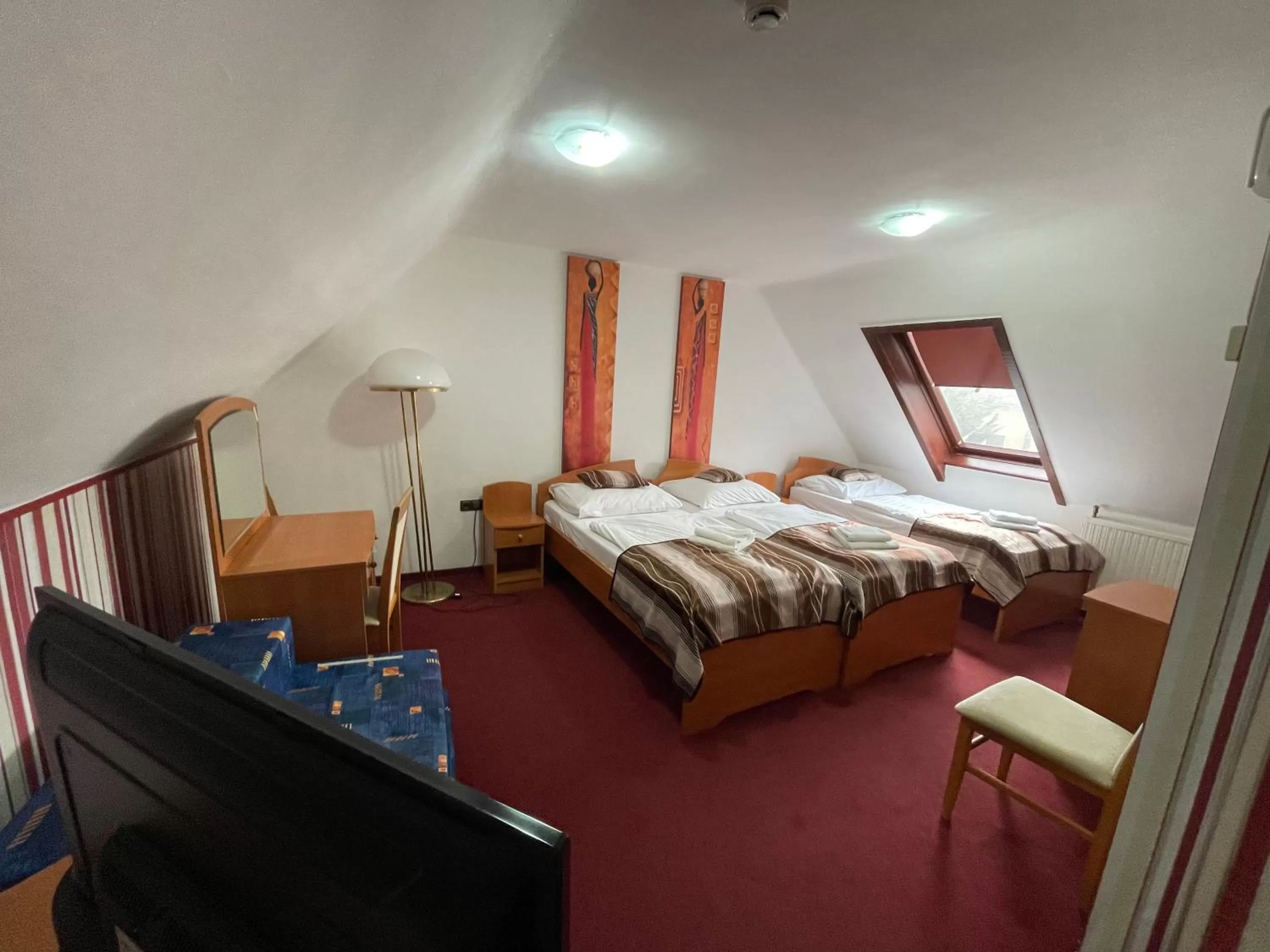 Bed in Hotel Minaret&Étterem