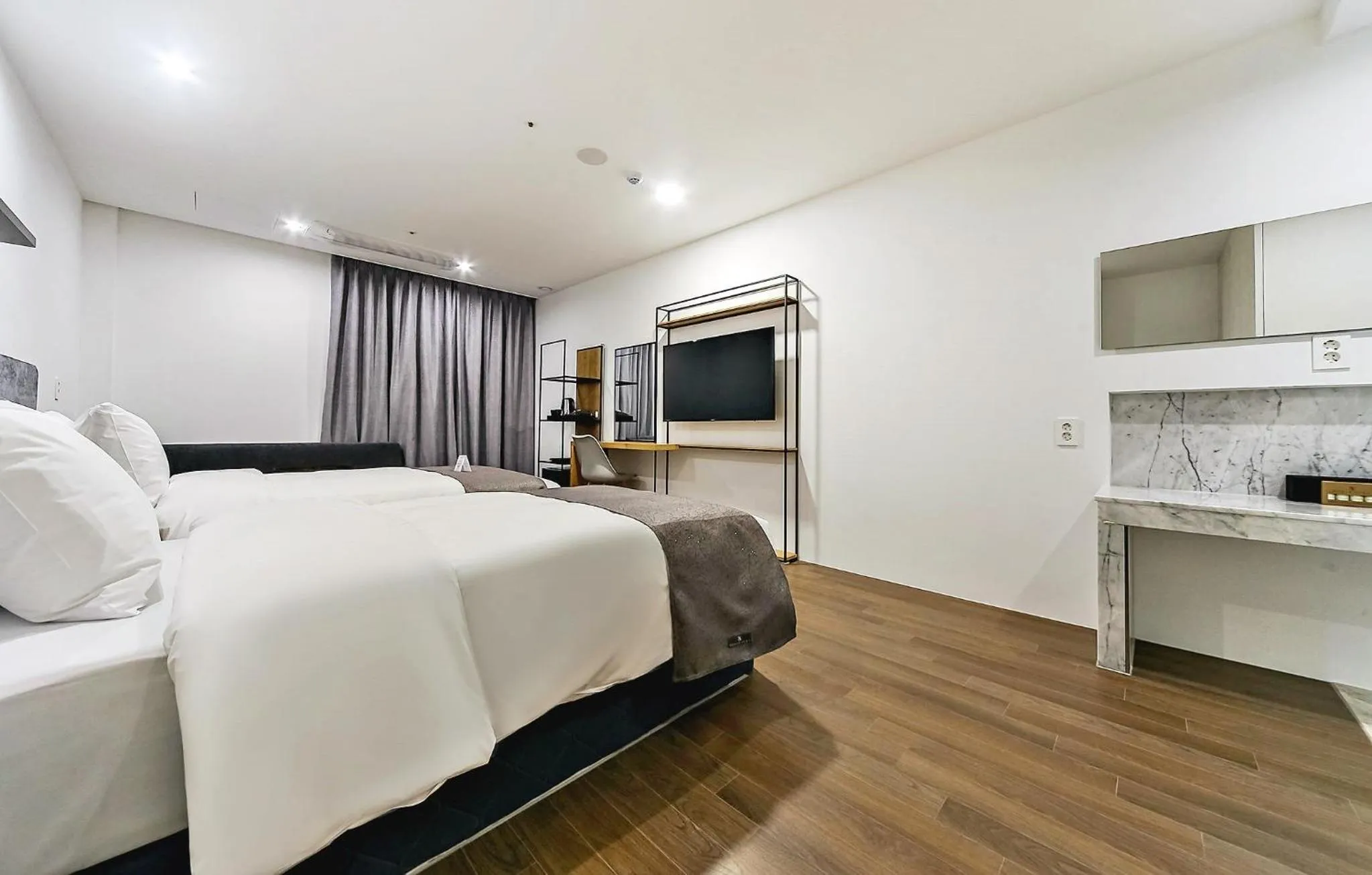 Bed in Hotel Noblestay