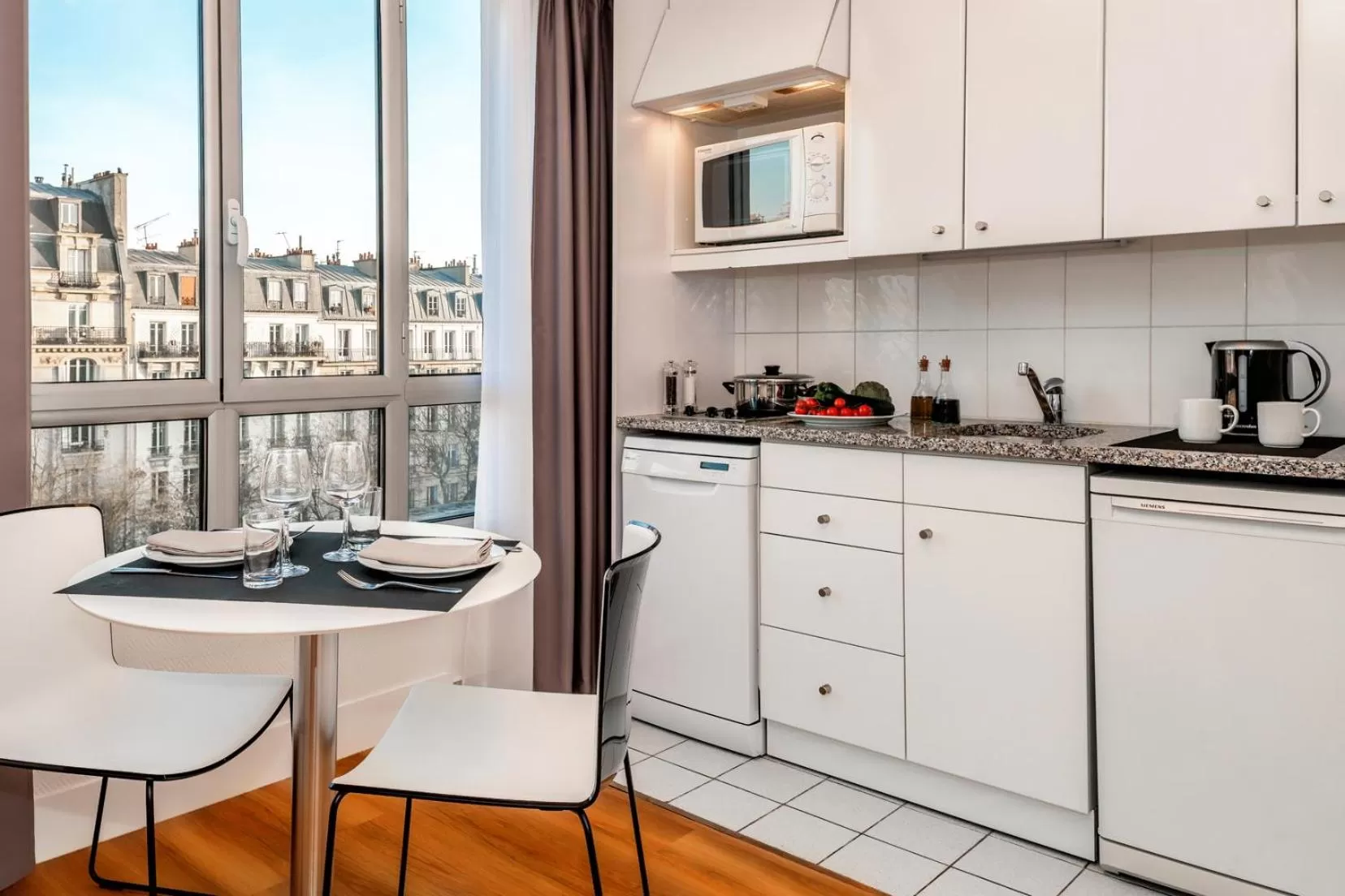 Kitchen or kitchenette in Citadines Bastille Marais Paris