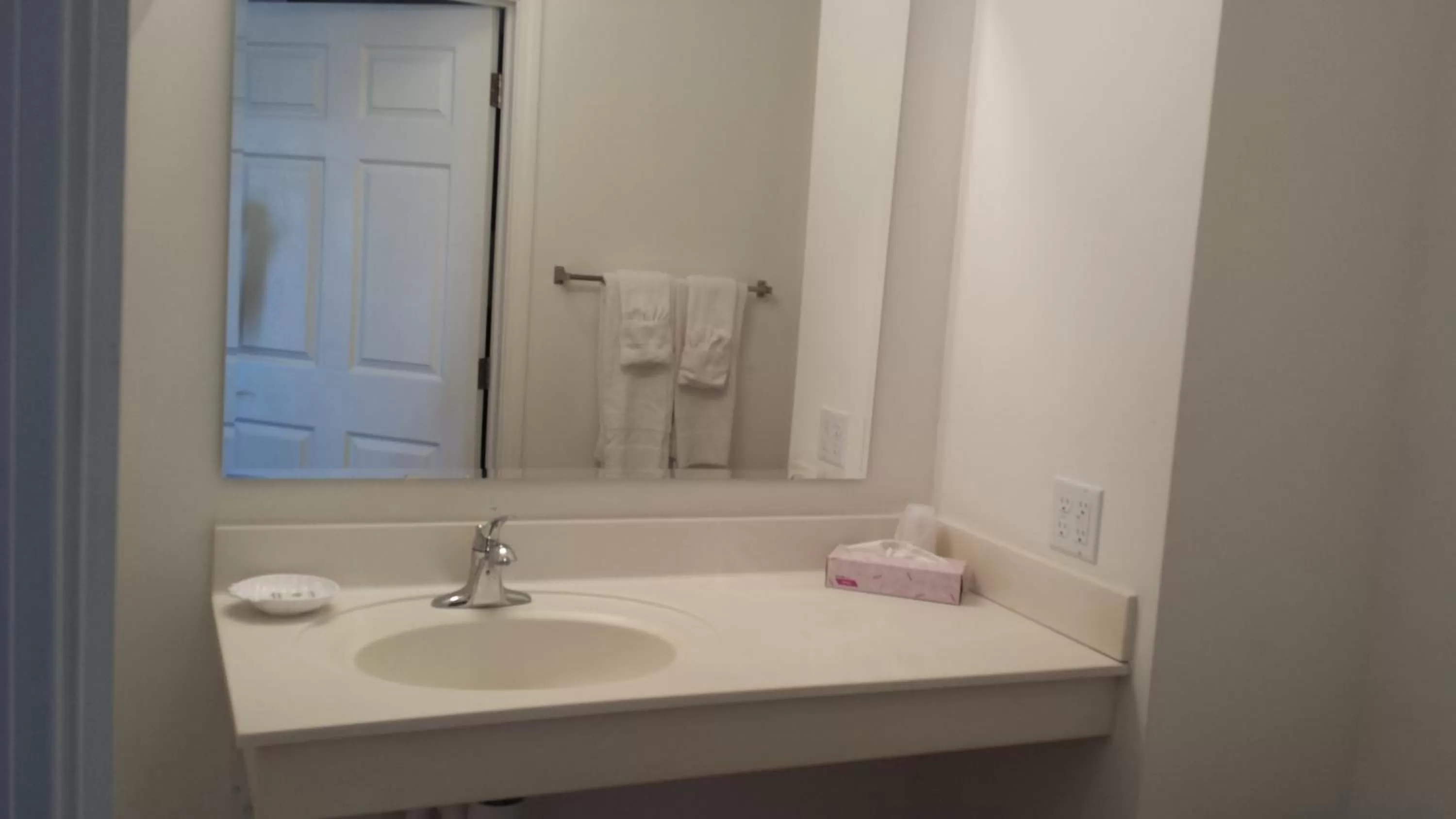 Bathroom in Ramada by Wyndham Williston