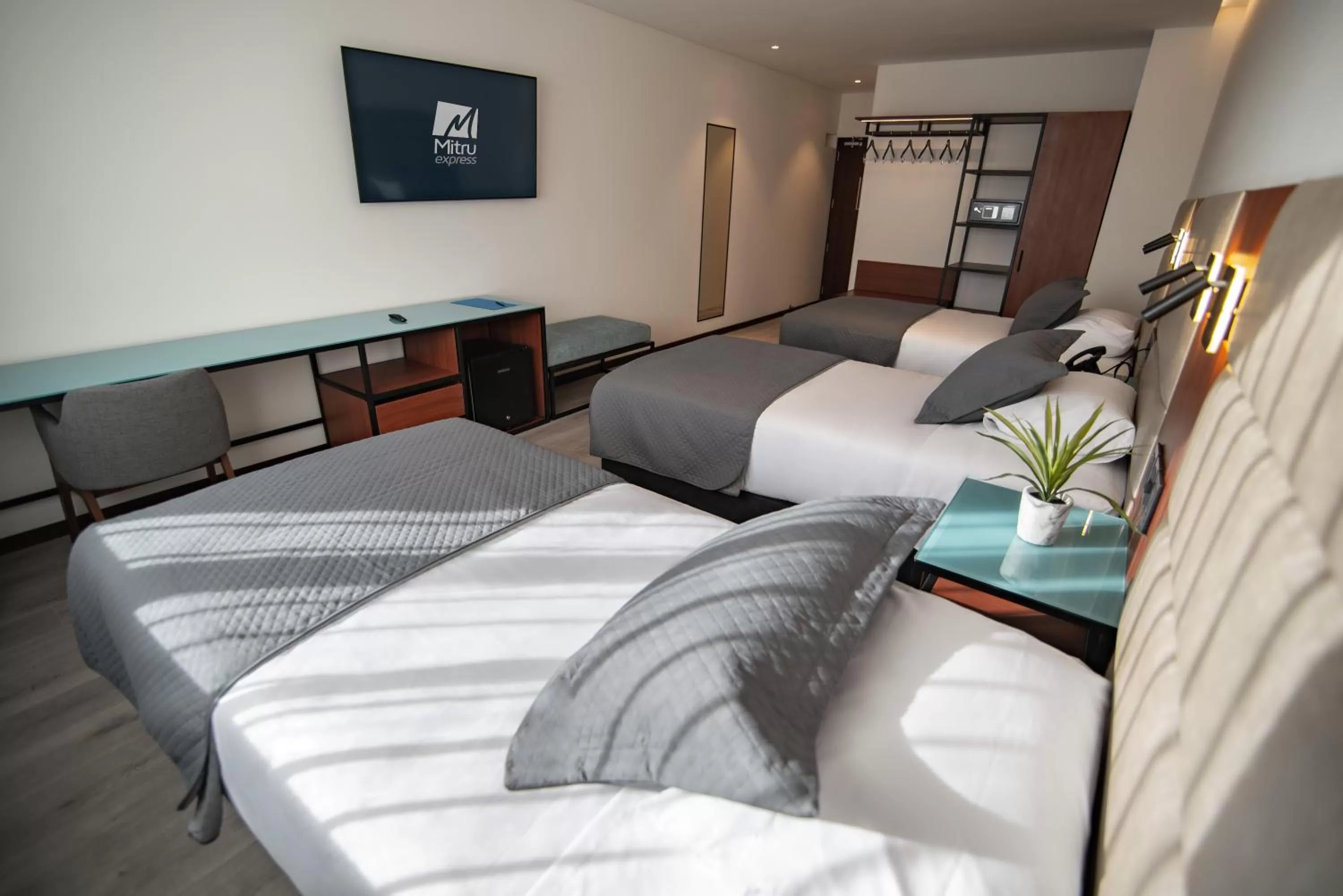 Bed in Mitru Express Hotel