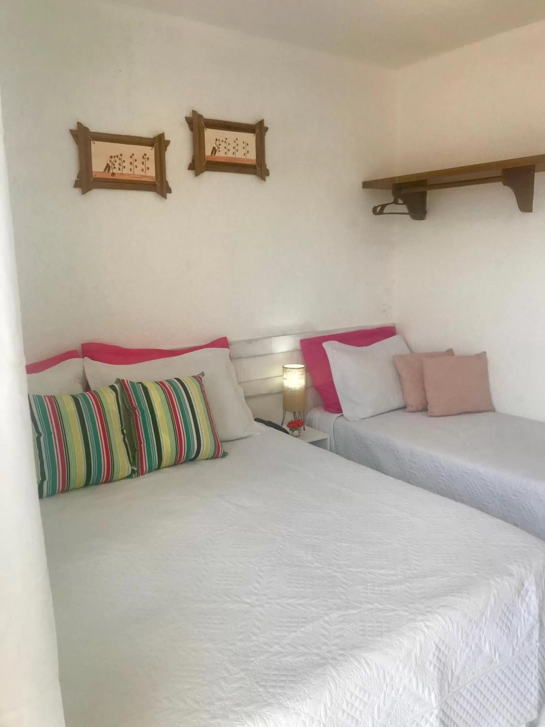 Bed in Pousada America do Sol