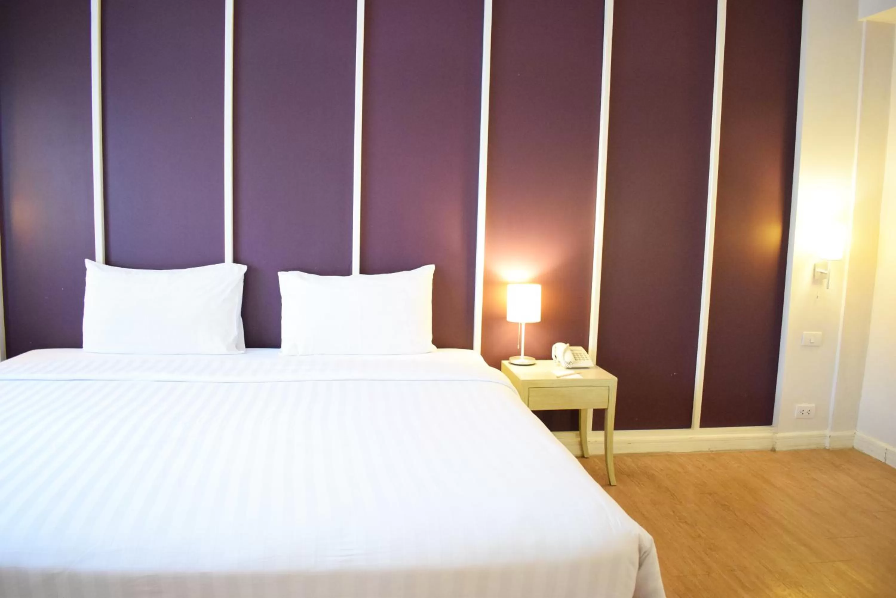 Bed in Trang Hotel Bangkok - SHA Plus