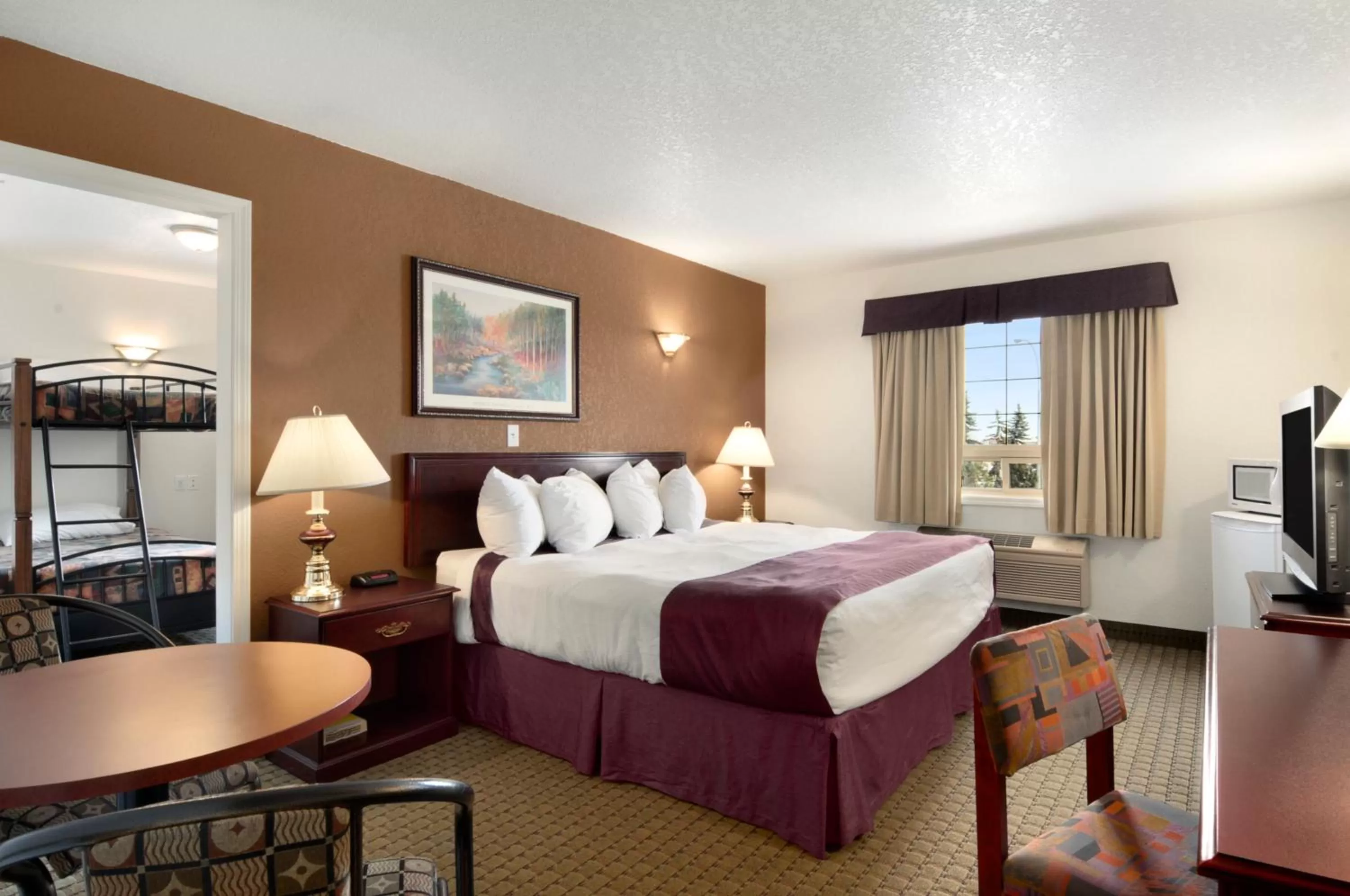 Bed in Ramada by Wyndham Red Deer Hotel & Suites