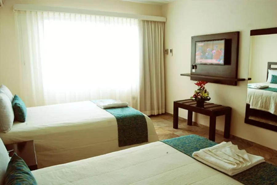 Bed in Hotel Andiroba Palace