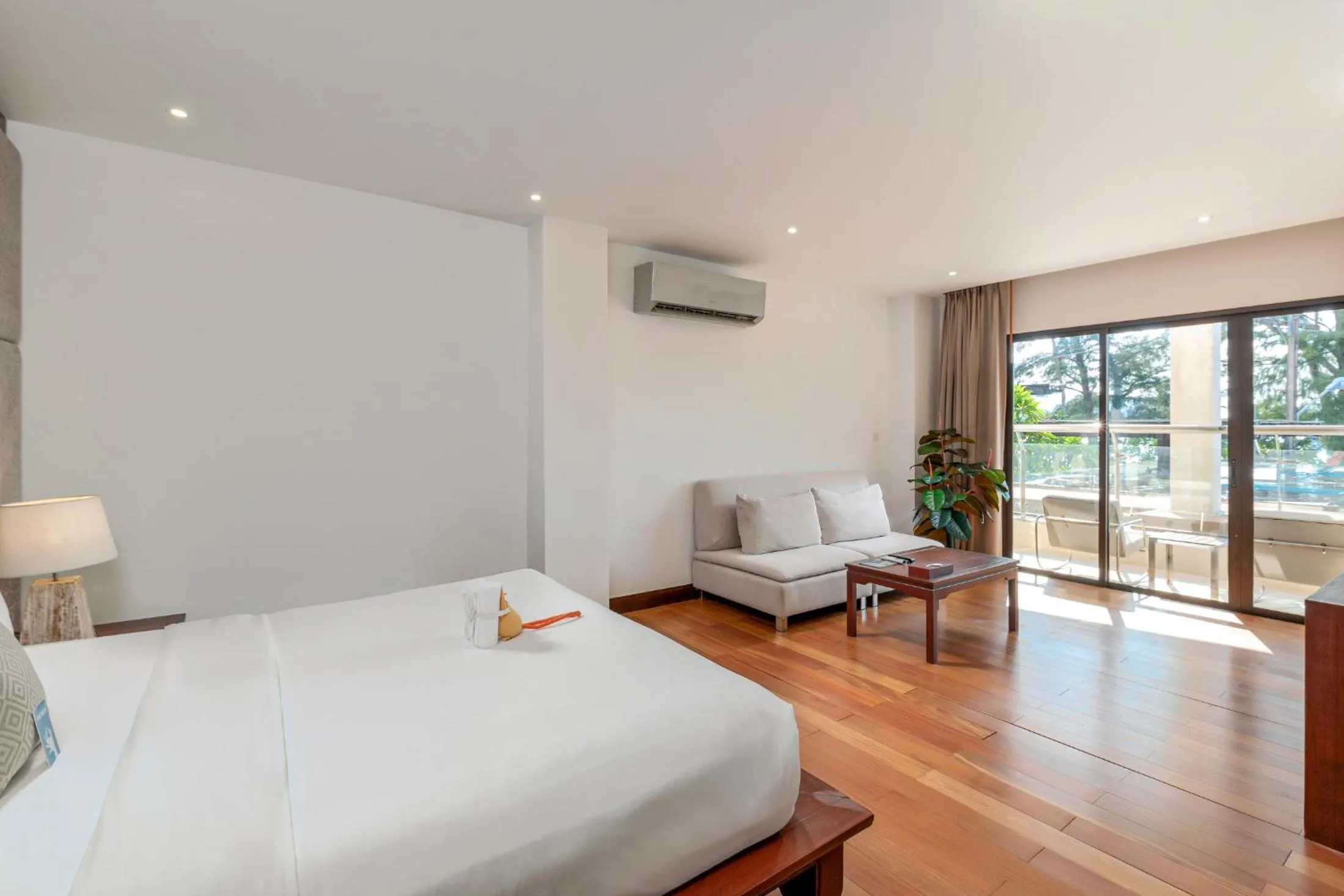 Photo of the whole room, Bed in Baan Laimai Beach Resort & Spa - SHA Extra Plus