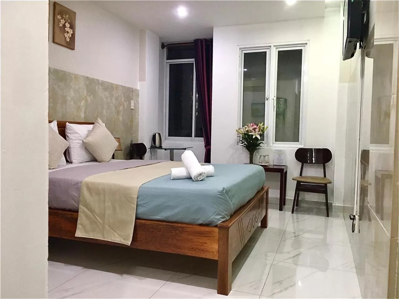 Bed in SaiGon CoZy Hotel "241 Pham Ngu Lao Street''