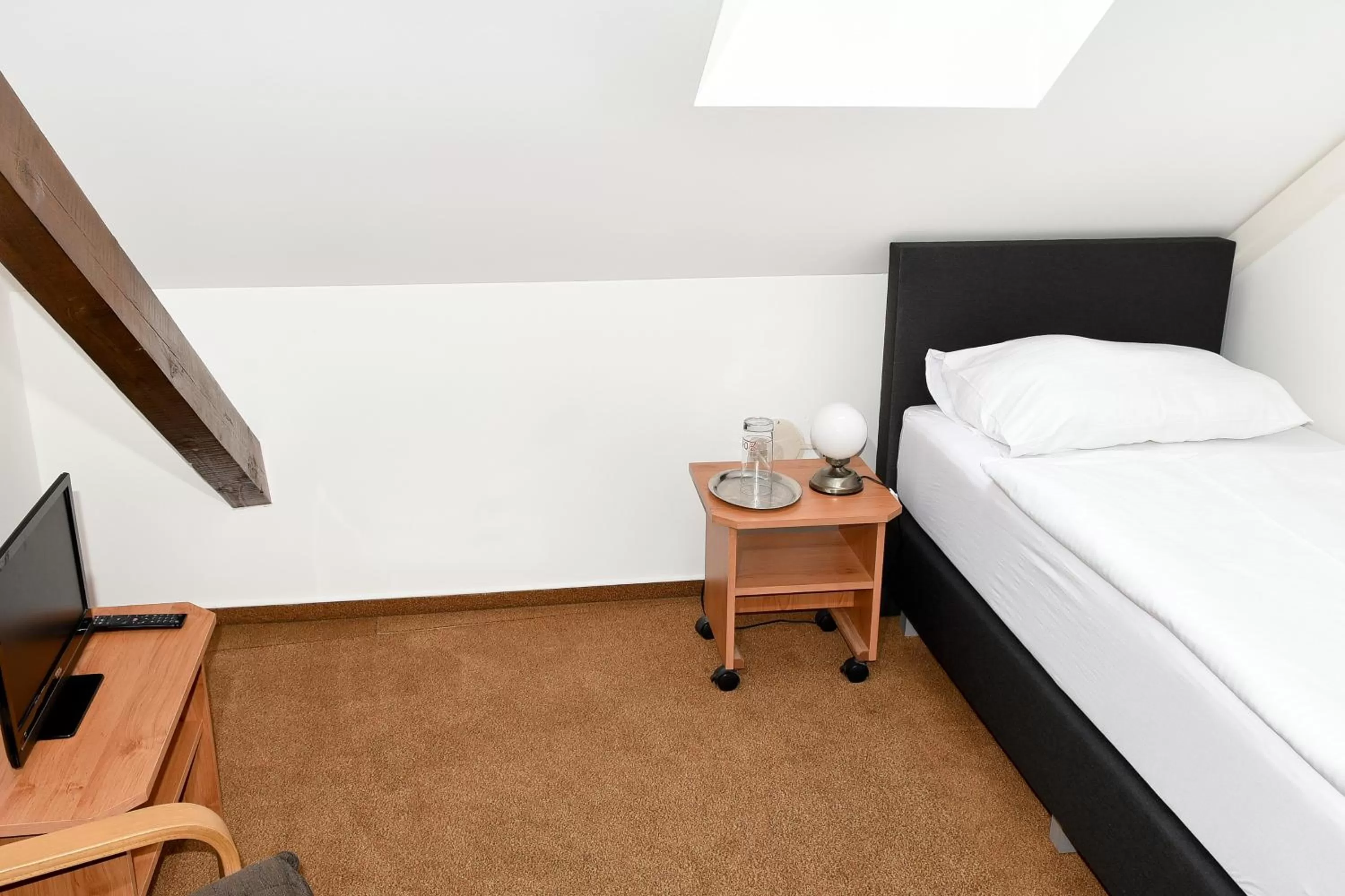 Bed in Hotel Bílý Koníček