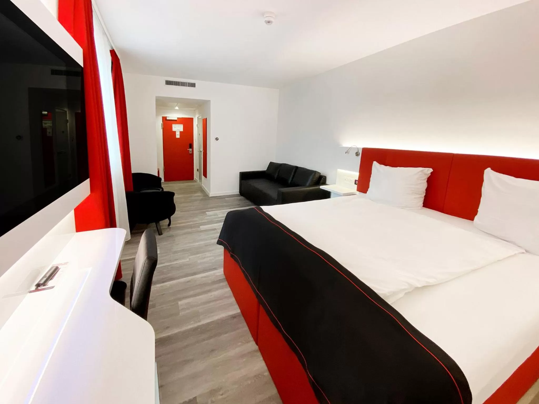 Photo of the whole room, Bed in DORMERO Hotel Darmstadt