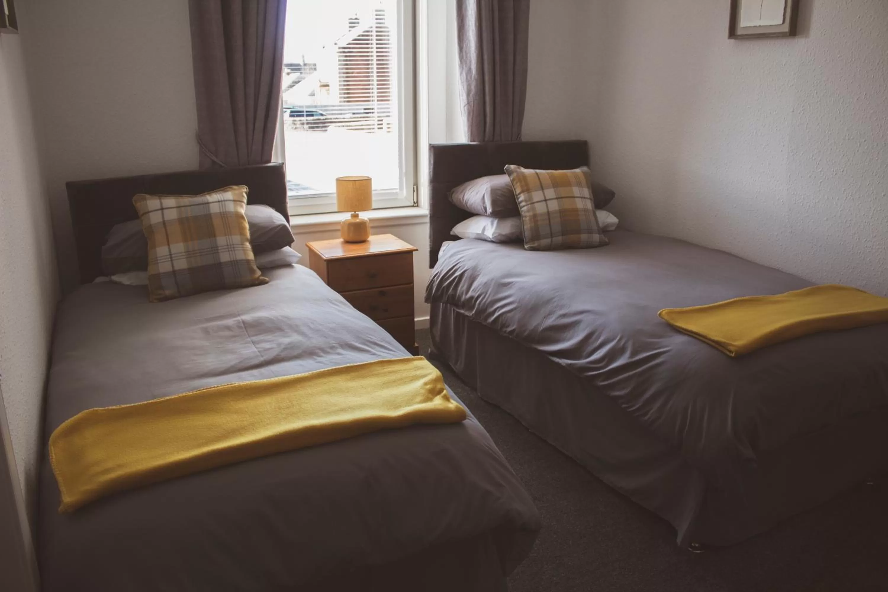 Bed in THE EARN HOTEL