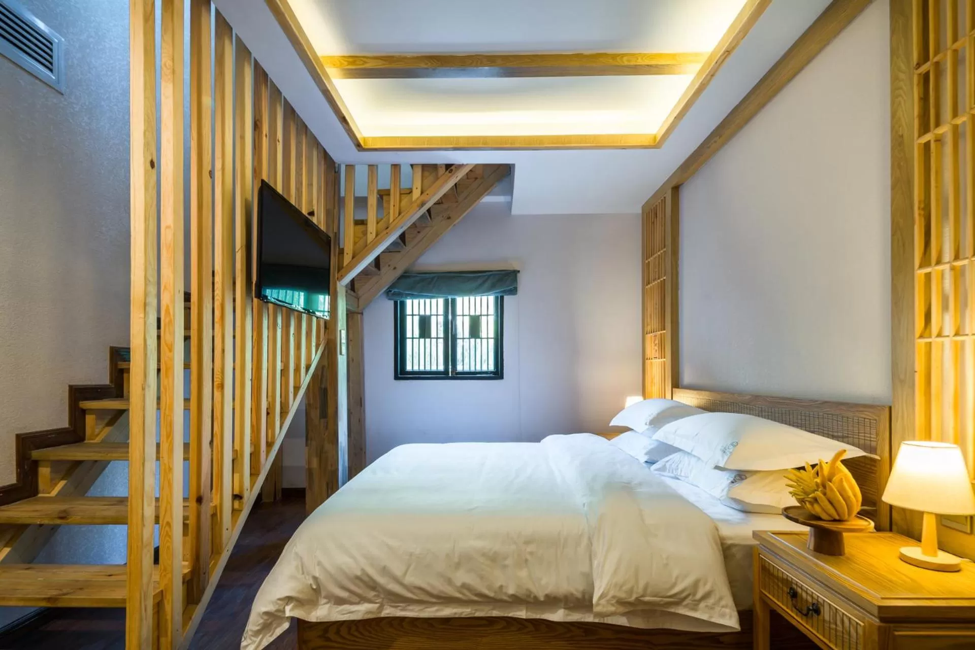 Bed in Lijiang Gemmer Hotel