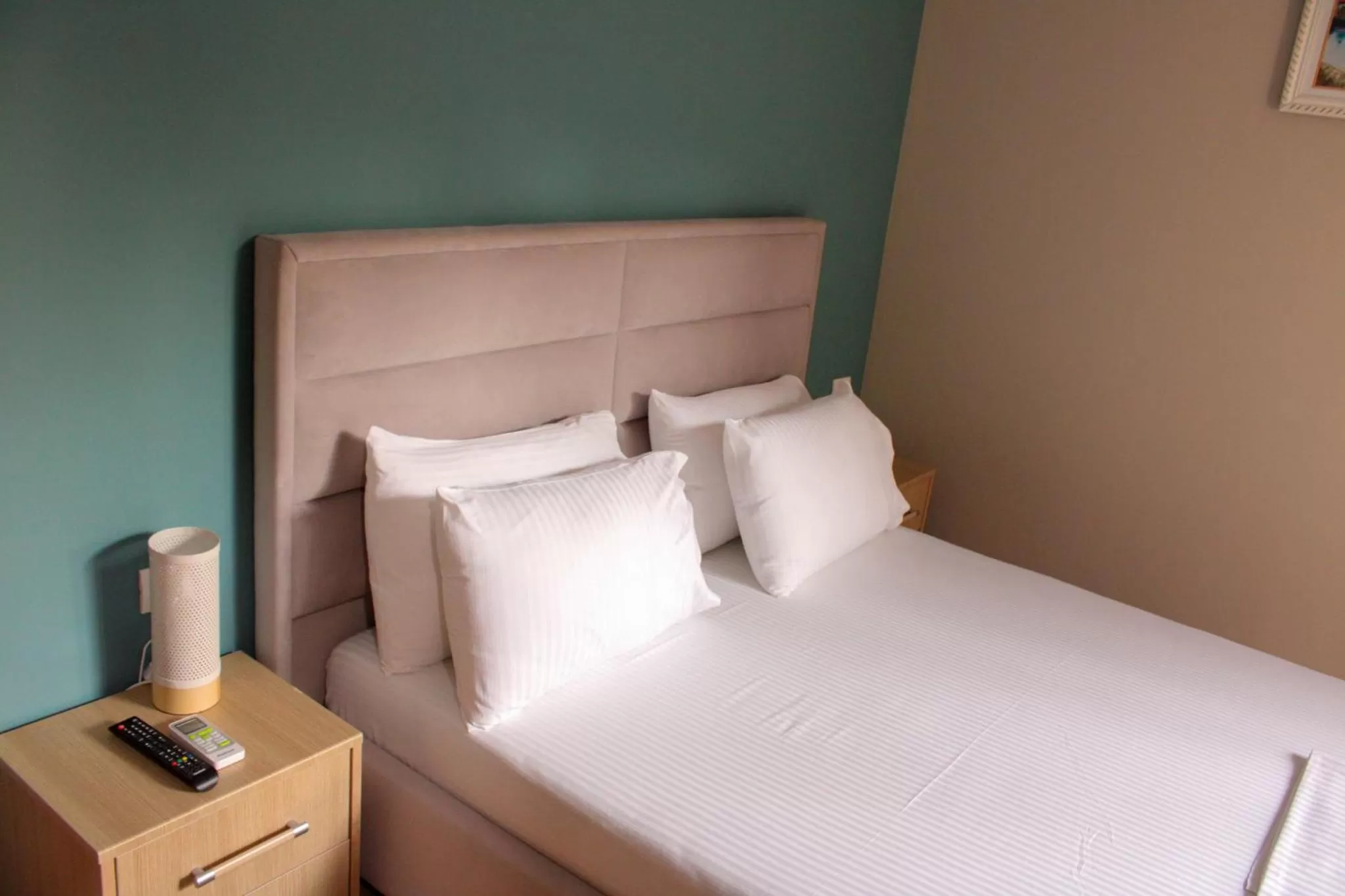 Bed in Aphrodite Garden Rooms & Apartment