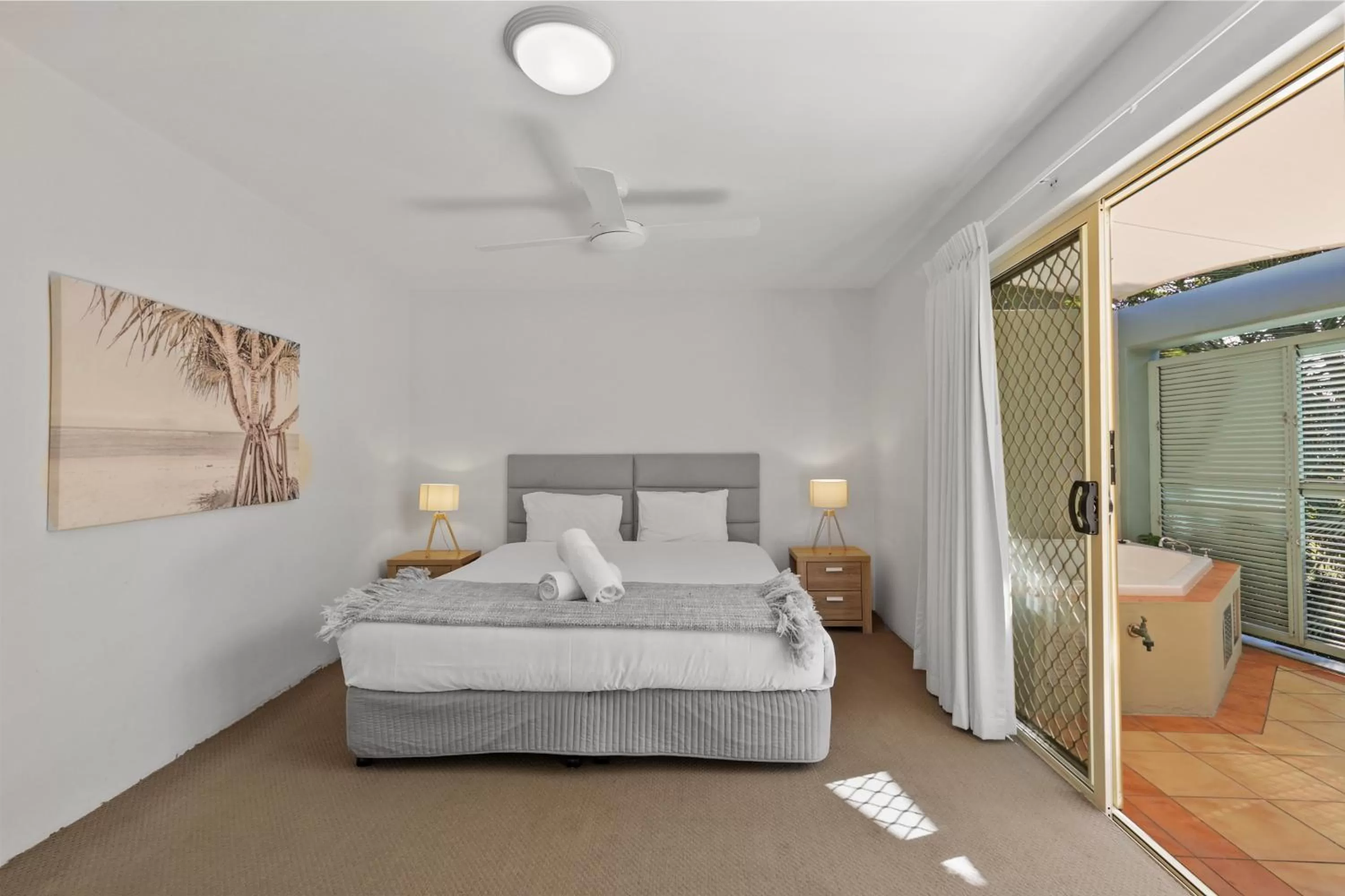 Bed in Lennox Beach Resort