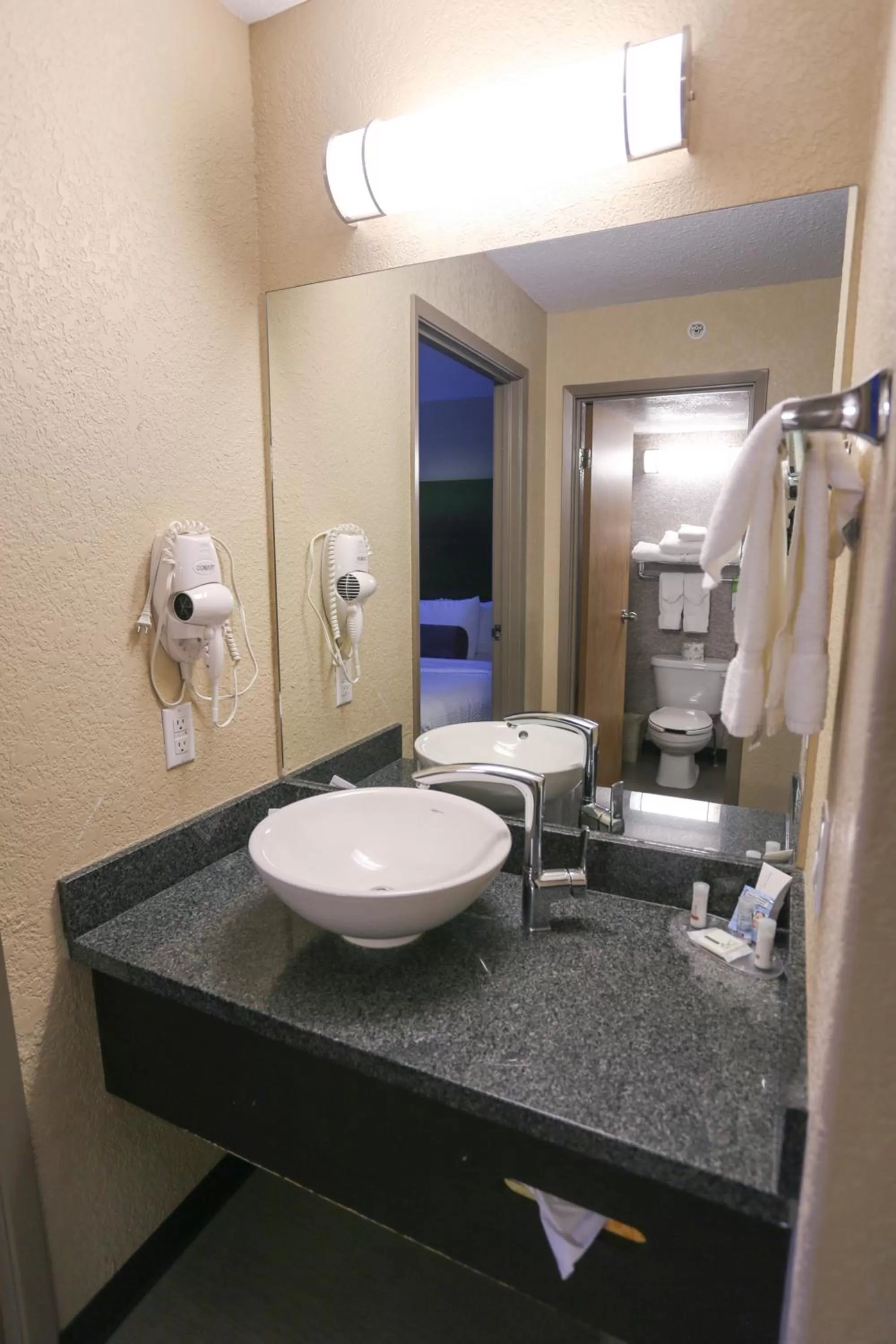 Bathroom in Days Inn by Wyndham Calgary Airport