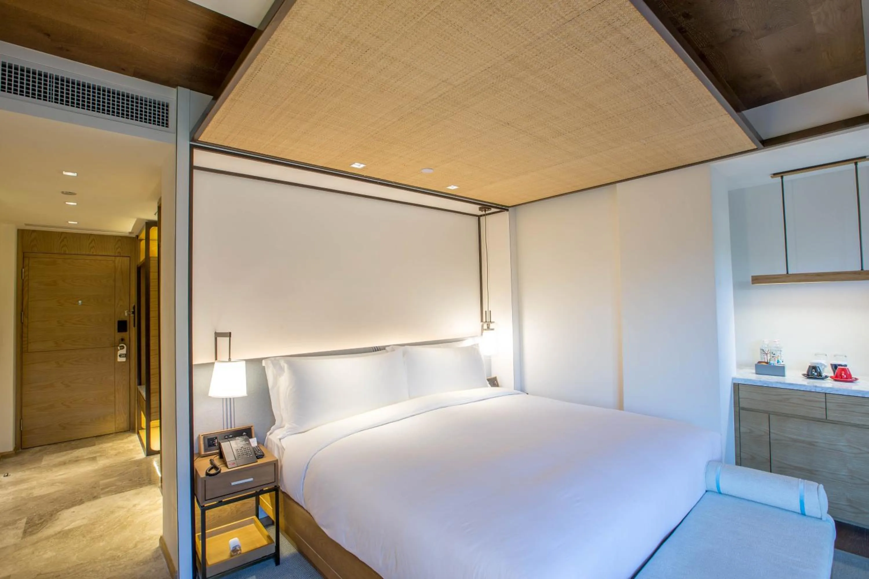 Bed in The Sifang Hotel Nanjing, Autograph Collection