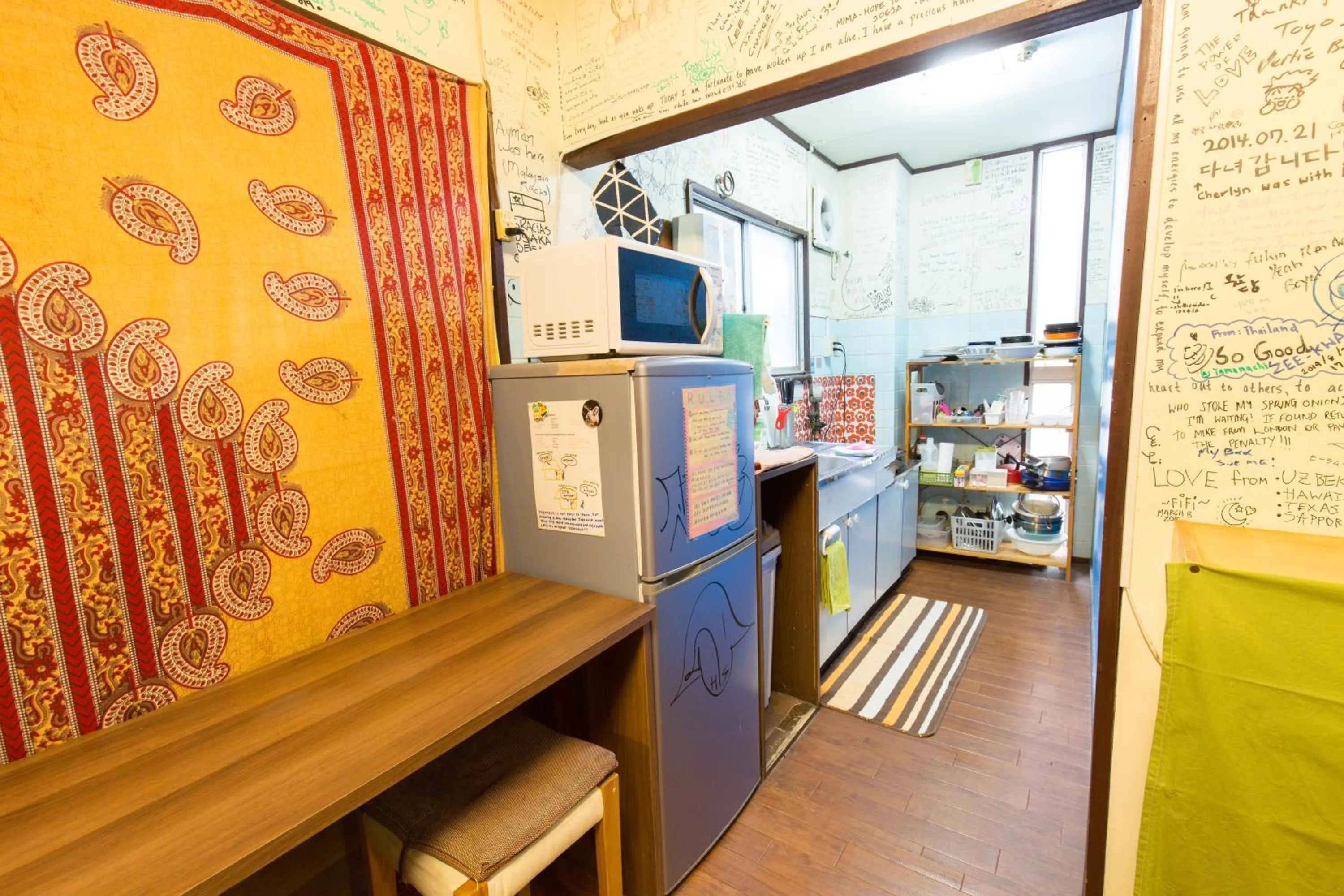 Kitchen or kitchenette in Backpackers Hotel Toyo