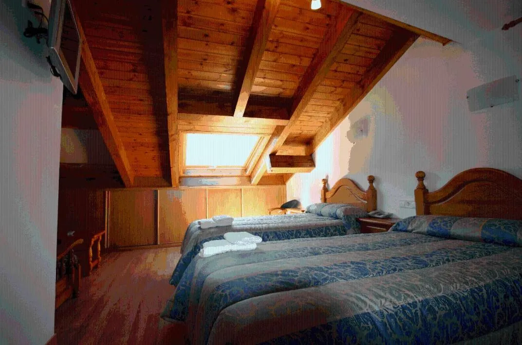 Bed in Hotel Can Mestre