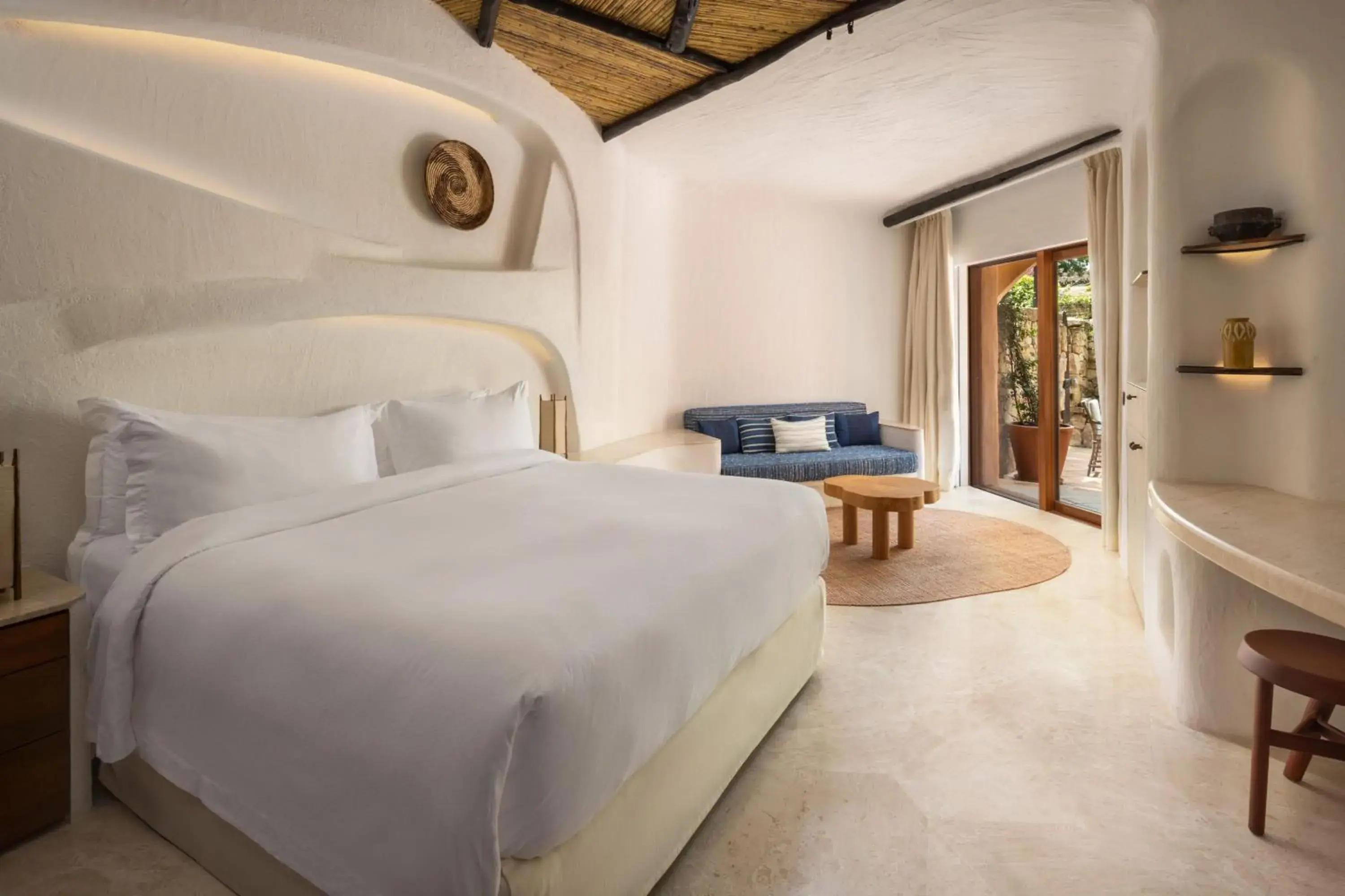 Contemporary Deluxe Suite, king bed, Inner View, terrace in Hotel Cala di Volpe, a Luxury Collection Hotel, Costa Smeralda Contemporary Deluxe Suite, king bed, Inner View, terrace in Hotel Cala di Volpe, a Luxury Collection Hotel, Costa Smeralda