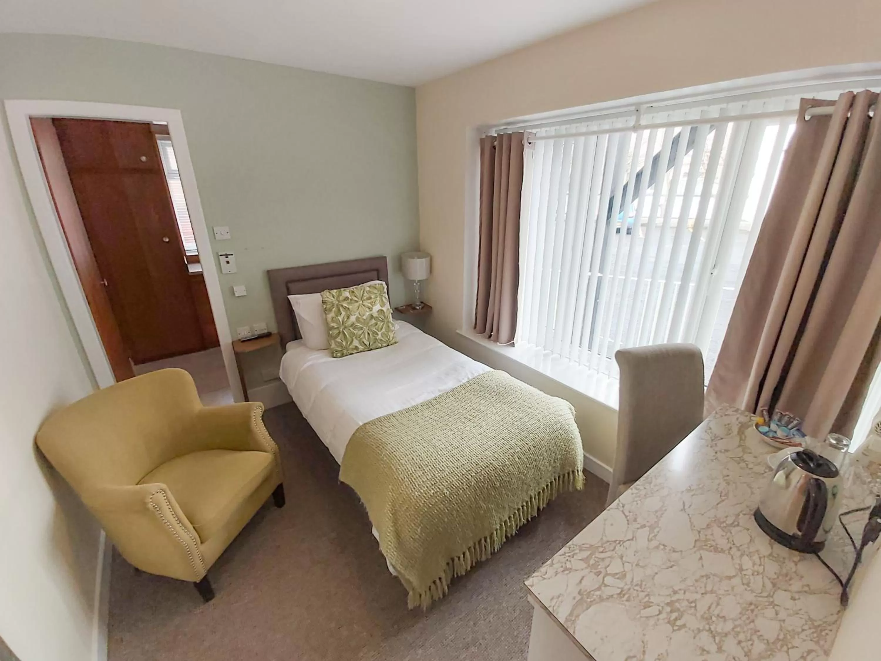 Bed in The Hawick Hotel