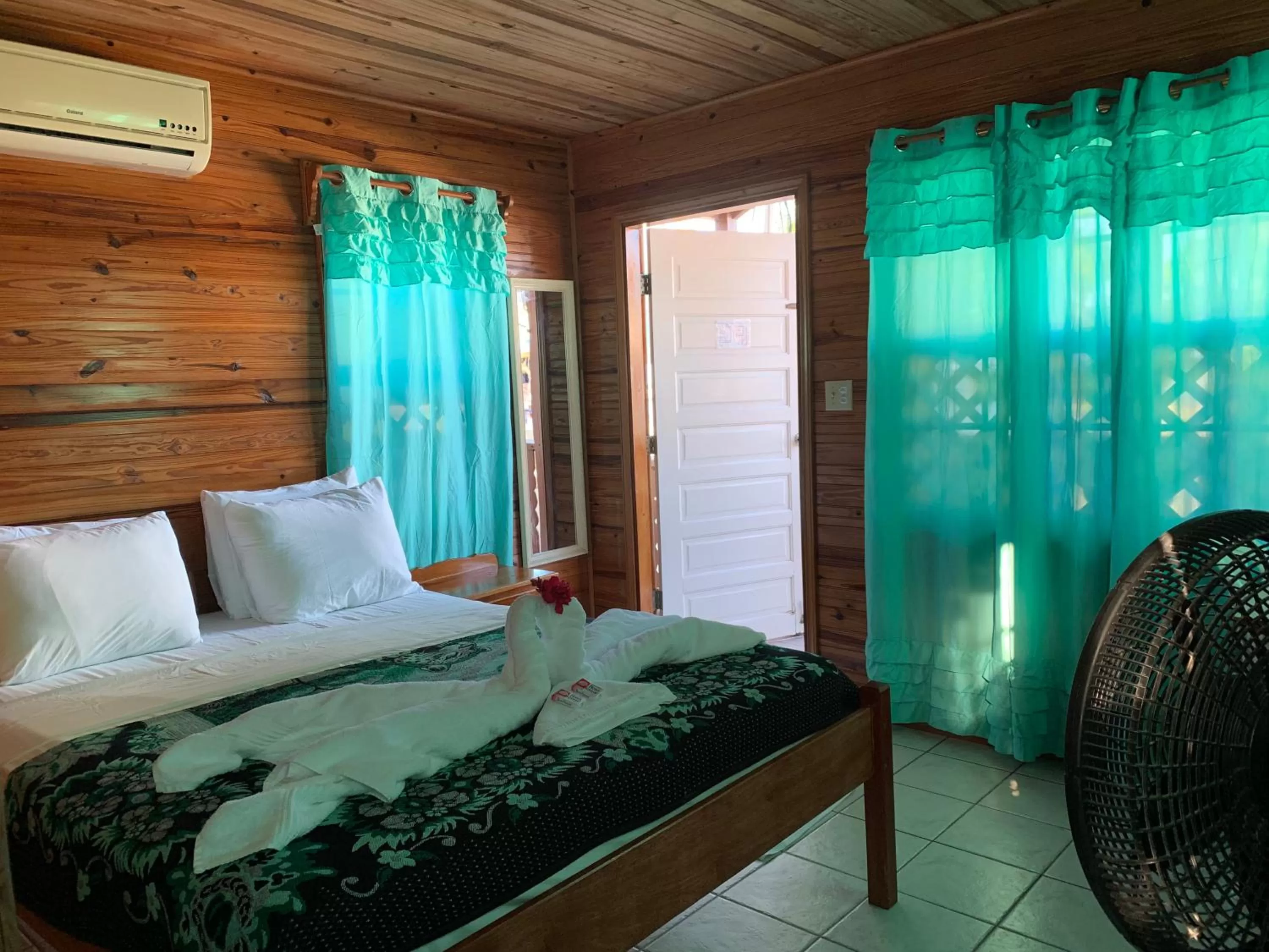 Bed in Blue Wave Guest House