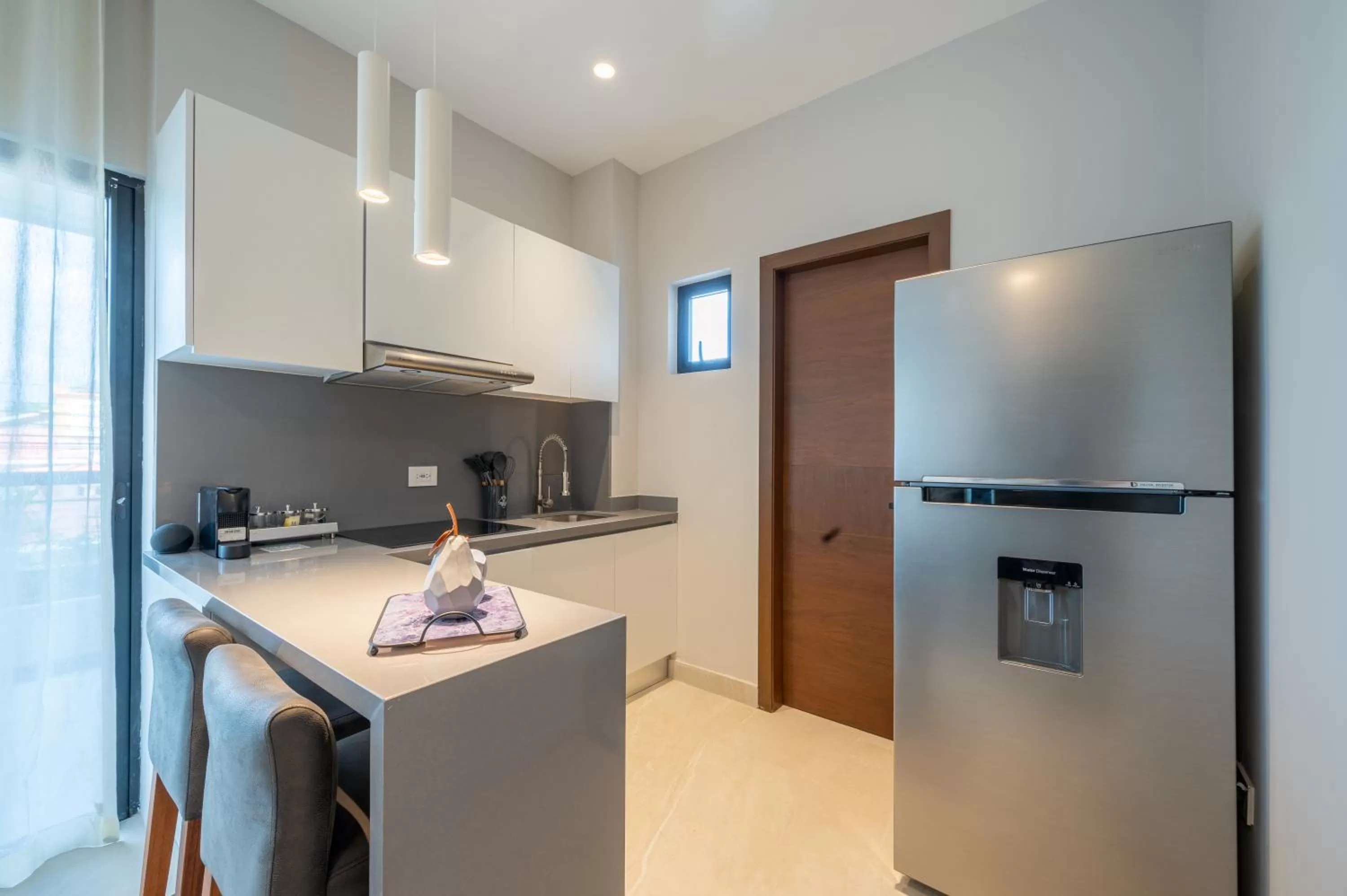 Kitchen or kitchenette in Kippal - Modern Oasis - ApartHotel