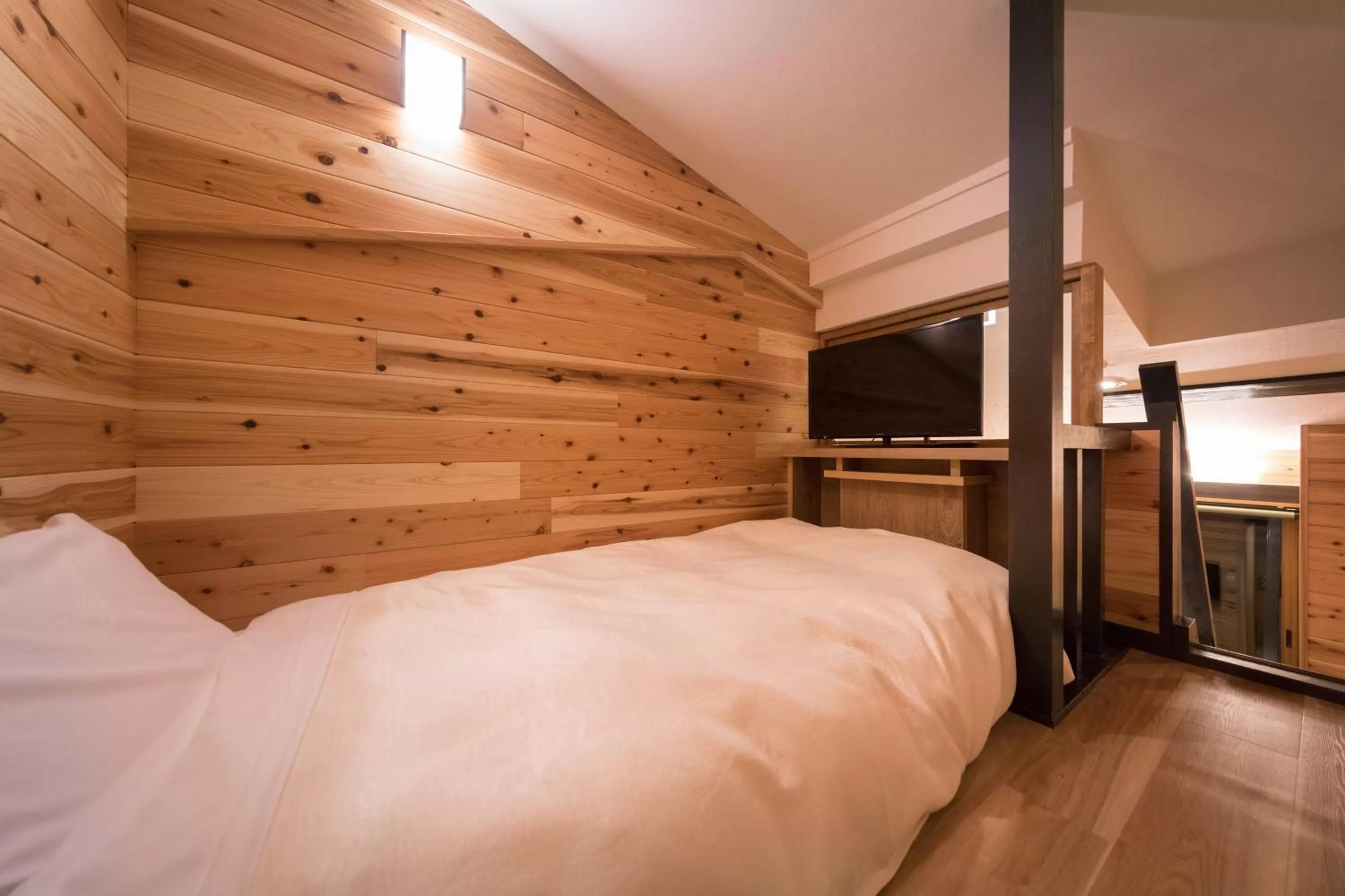 Bed in Hotel Miyajima Villa