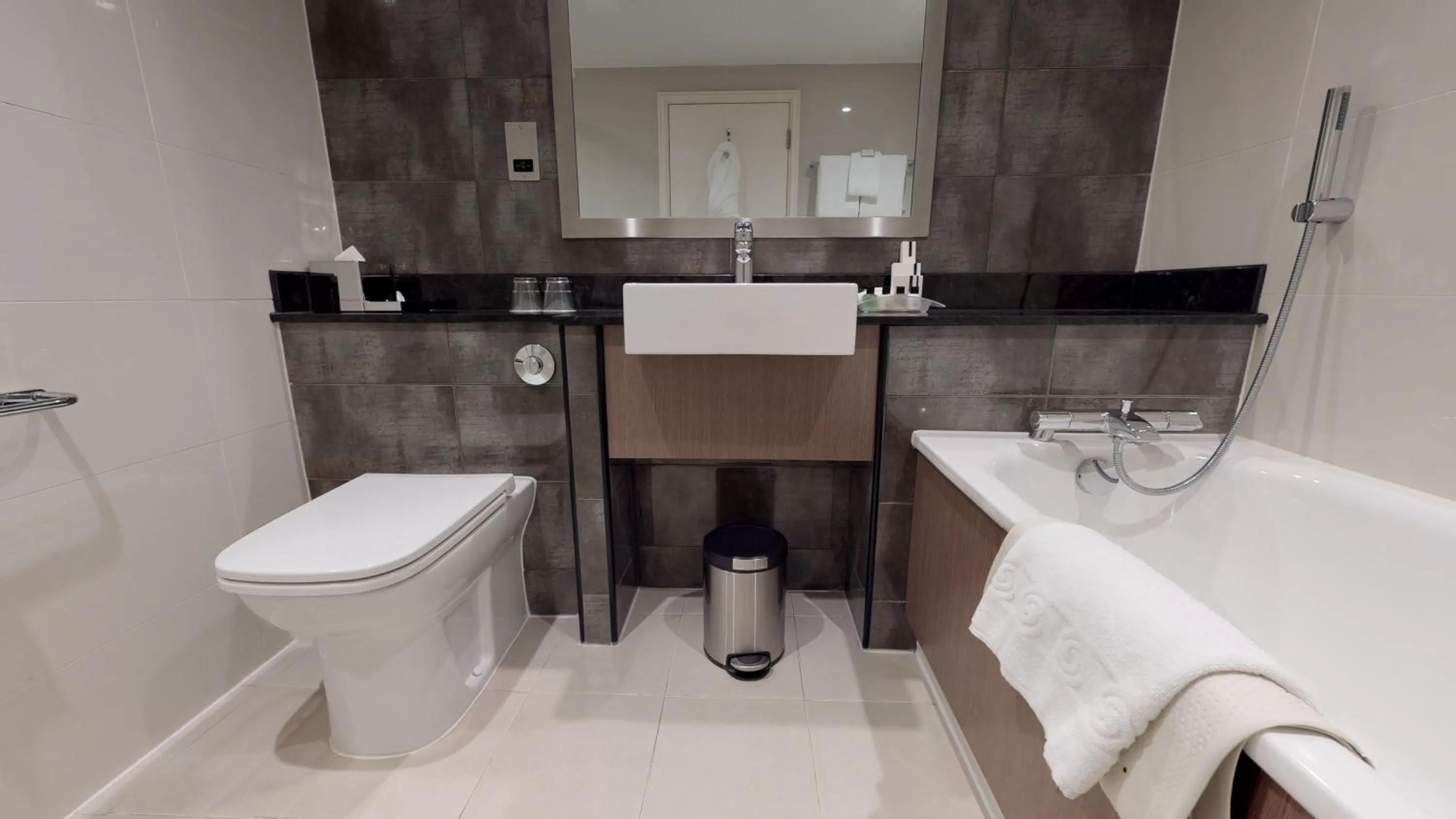 Bathroom in Holiday Inn London Kensington High St. by IHG